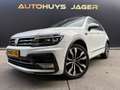 Volkswagen Tiguan 2.0 TDI 4Motion Highline|Pano|Leer|Dynaudio|Camera Wit - thumbnail 1