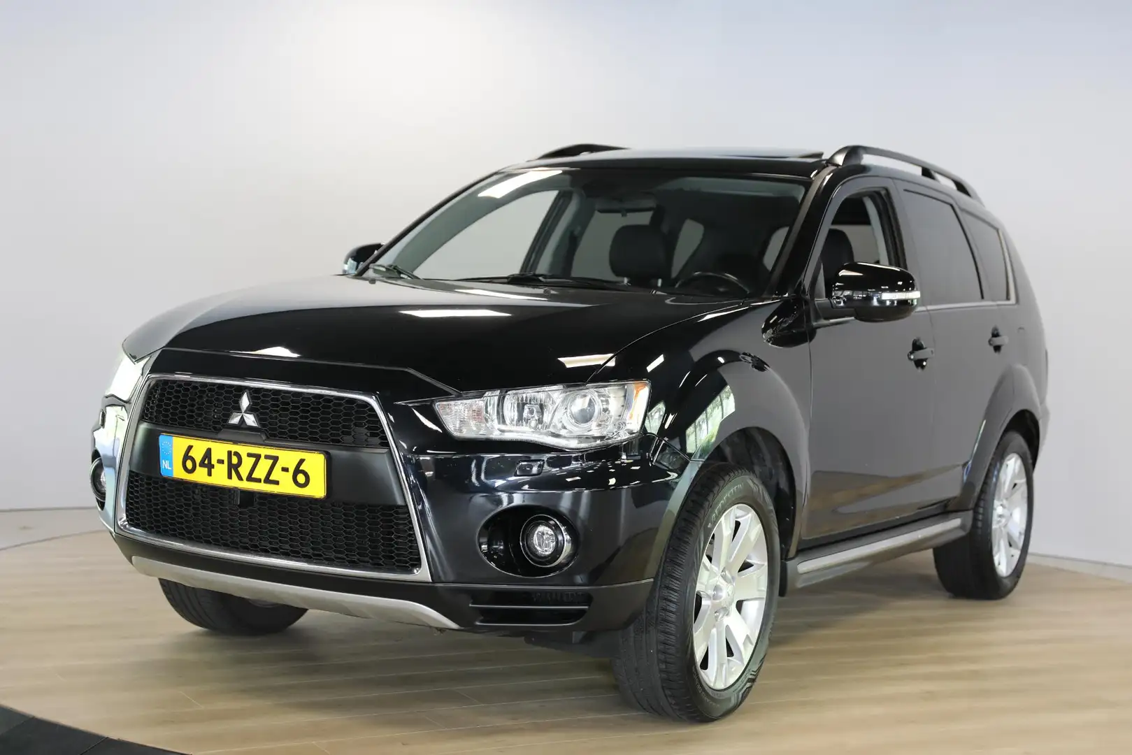 Mitsubishi Outlander 2.0 Instyle | 1e eigenaar | Leer | Schuif-kantel d Noir - 1