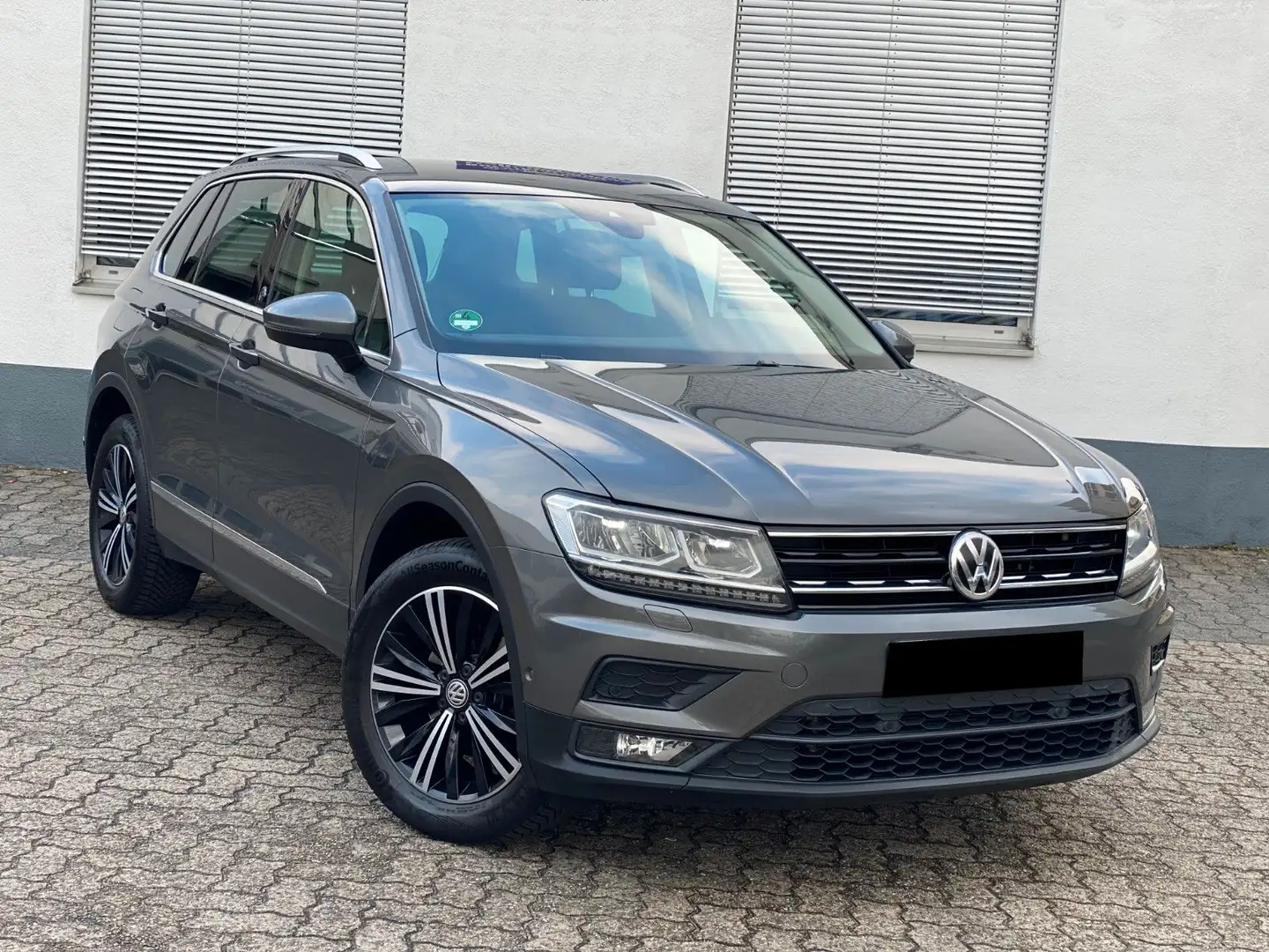 Volkswagen Tiguan 1.4 TSI AUTOMATIK DSG 4MOTION SOUND Grijs - 1