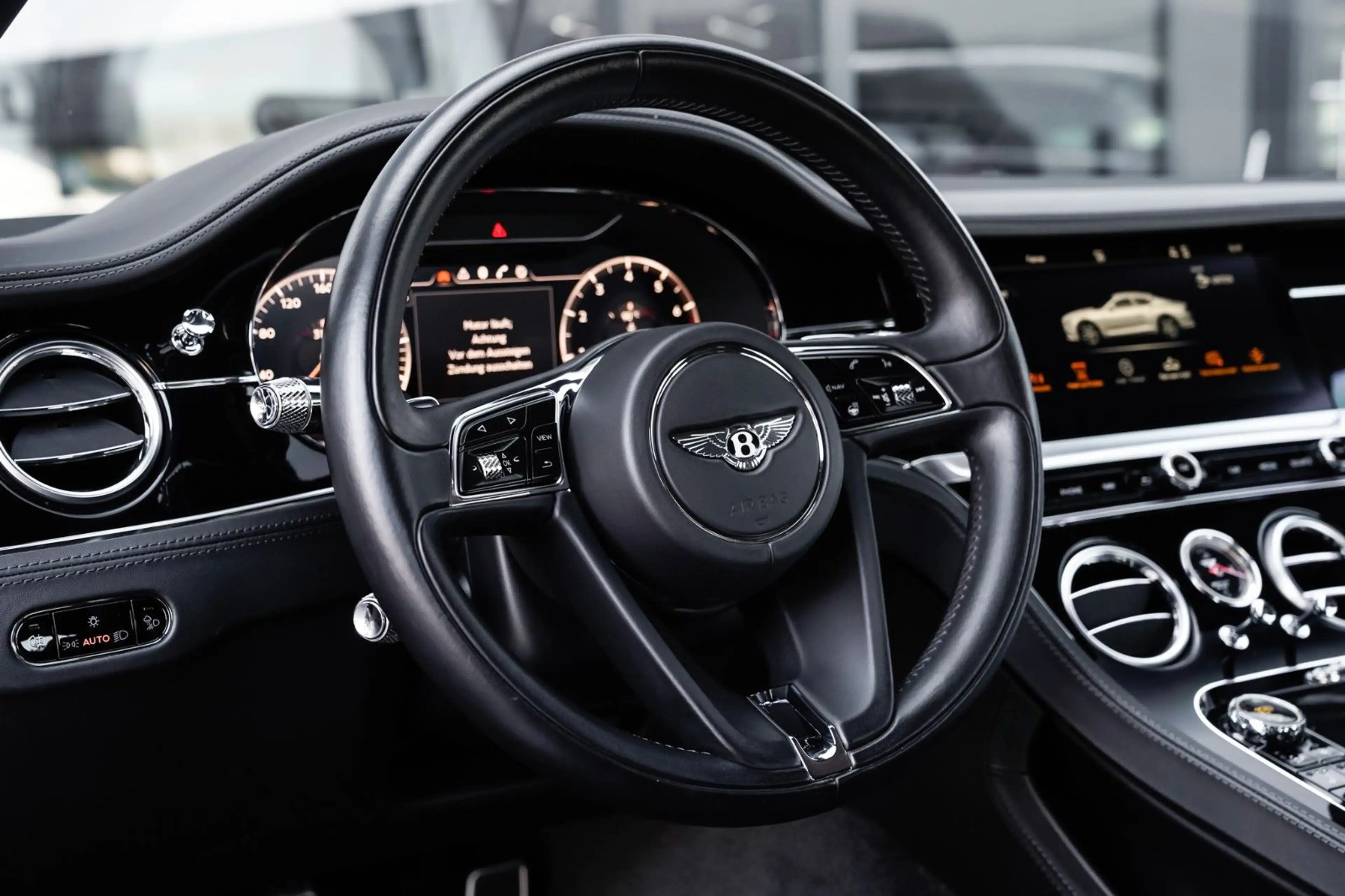 Bentley Continental GT W12 Mulliner Blackline-B&O — photo 15