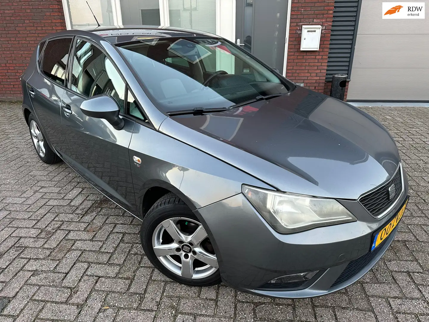 SEAT Ibiza 1.2 TSI Style / 1e eig / PDC / Cruise / Airco / NA Gris - 1