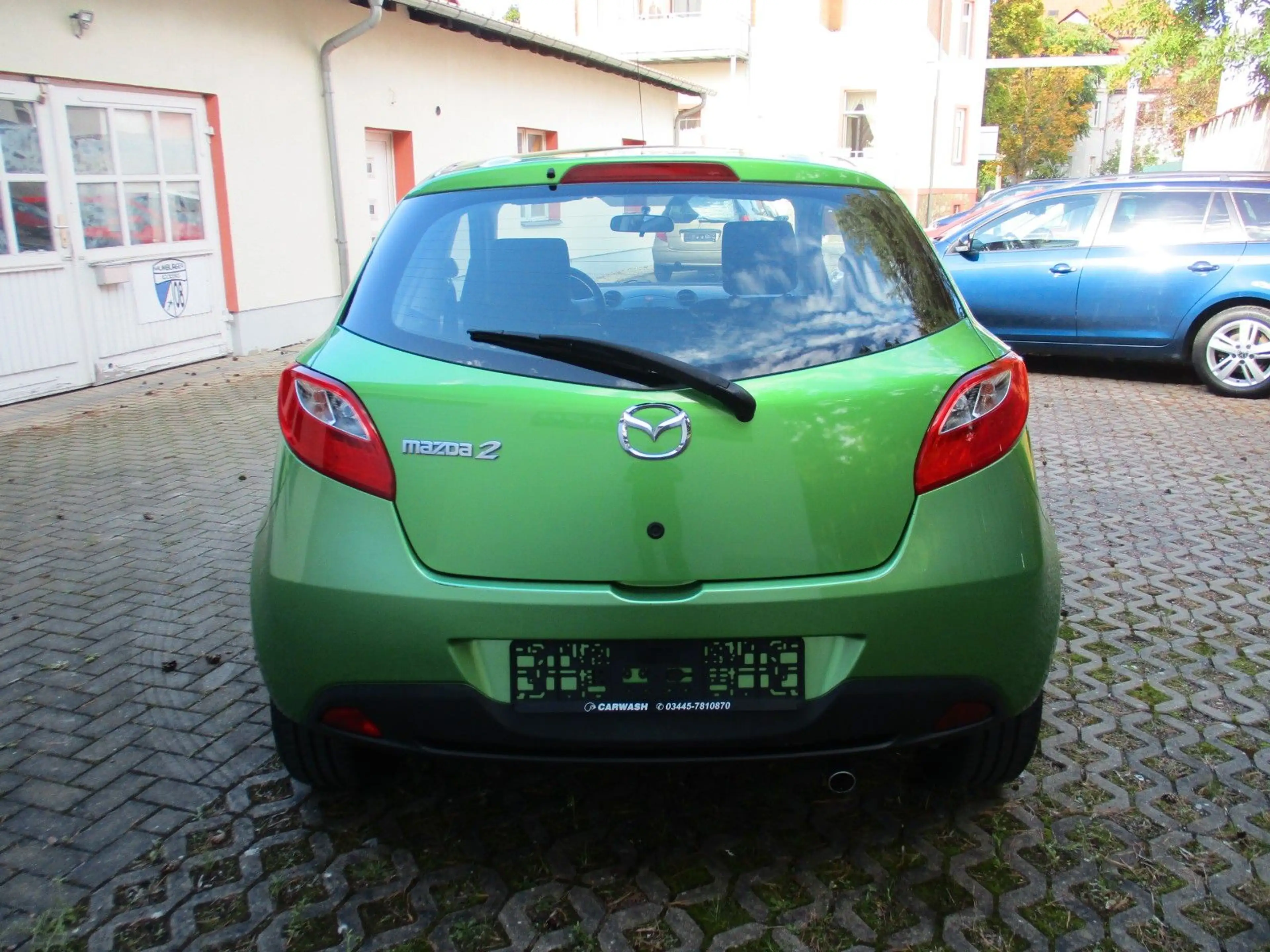 Mazda 2 Lim. 1.3 Edition / Klima / TÜV neu — photo 7