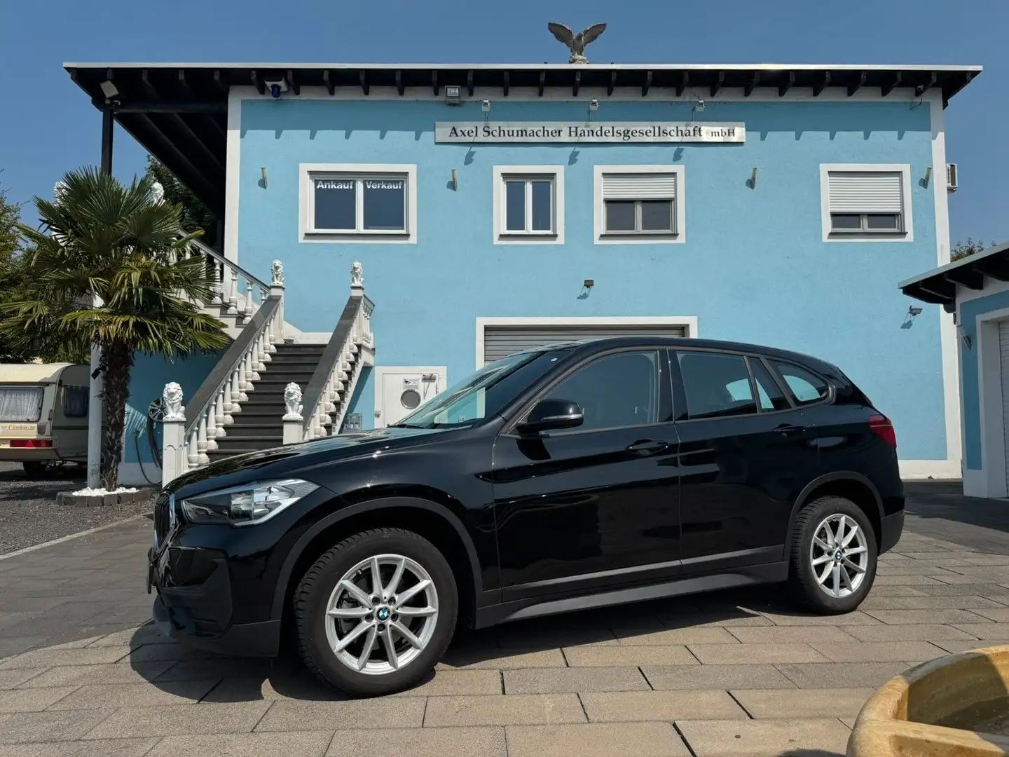 BMW X1 sDrive 18 i Advantage 1.Hand Garantie! Zwart - 1