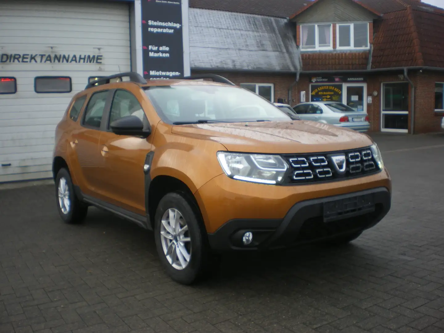 Dacia Duster 1,2 TCe Comfort St&St/Klima/Service immerbei Dacia Orange - 1