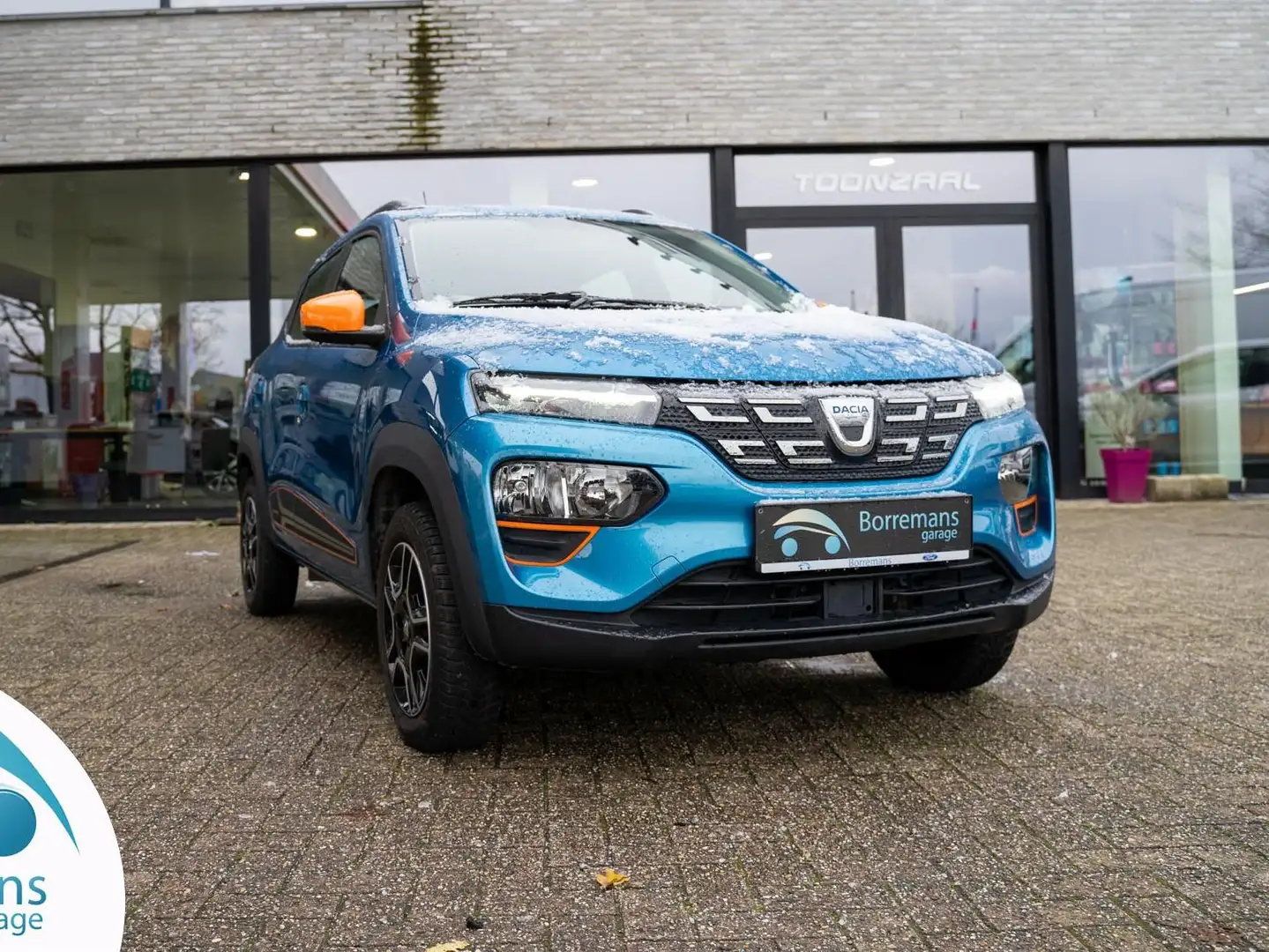 Dacia Spring 27 KWH COMFORT PLUS NAVI/BLUETOOTH/ LEDER/... Bleu - 1