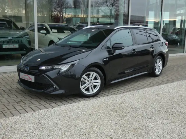 Toyota Corolla Hybrid +Parkeersensoren V&A +Keyless +GSM Charger