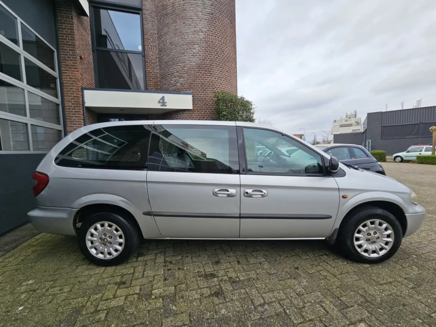 Chrysler Grand Voyager 2.4i SE Luxe 7Persoons |Nap |Apk |Youngtimer Grau - 2