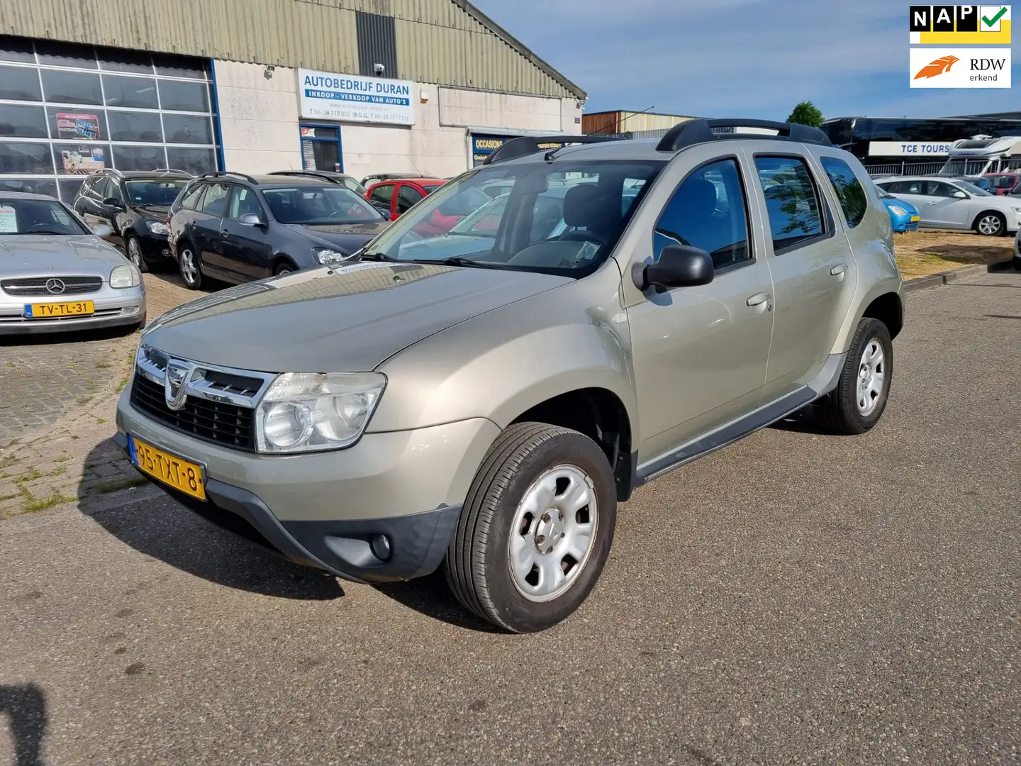 Dacia Duster 1.6 Lauréate LPG -G3 2wd Airco! Bj:2012 NAP! Grijs - 1