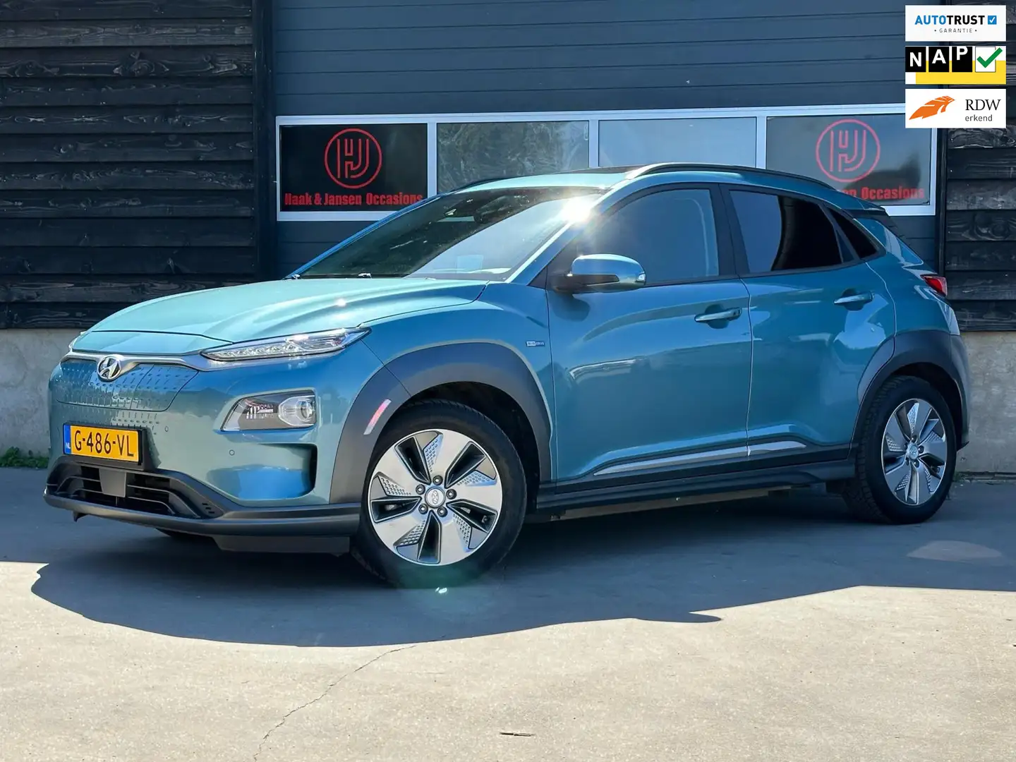 Hyundai KONA EV Premium 64 kWh - Pano - HUD - Stoelverwarming Kék - 1