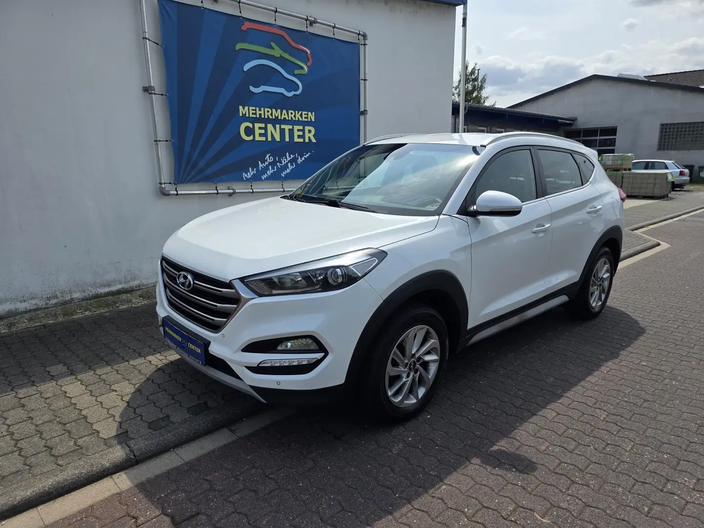 Hyundai TUCSON 1.6 AHK Navi RCam BT PDC 17"Alu Shzg 97 kW (132... Wit - 1