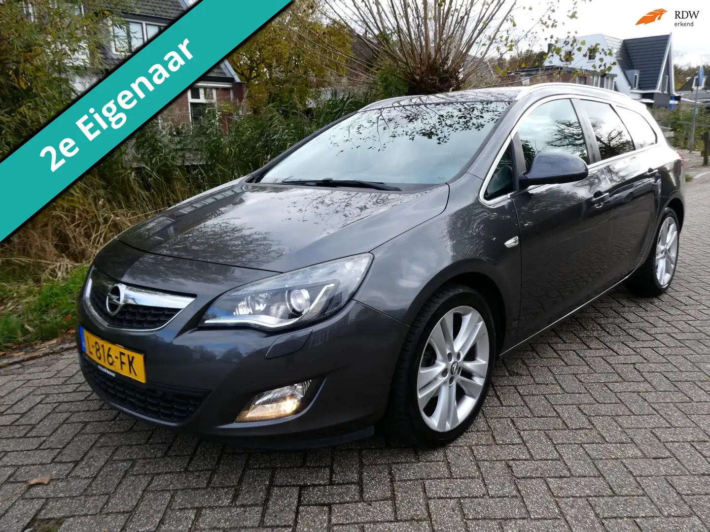 Opel Astra Sports Tourer 1.4 Turbo Sport 140pk 2e eig. Histor Gris - 1
