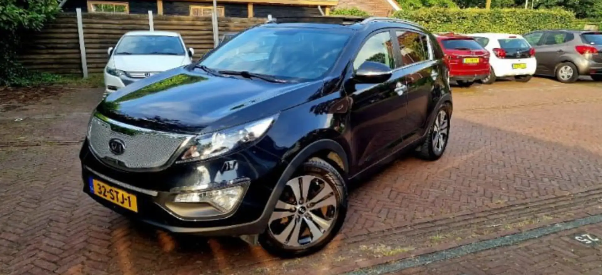 Kia Sportage 2.0 X-clusive Noir - 1