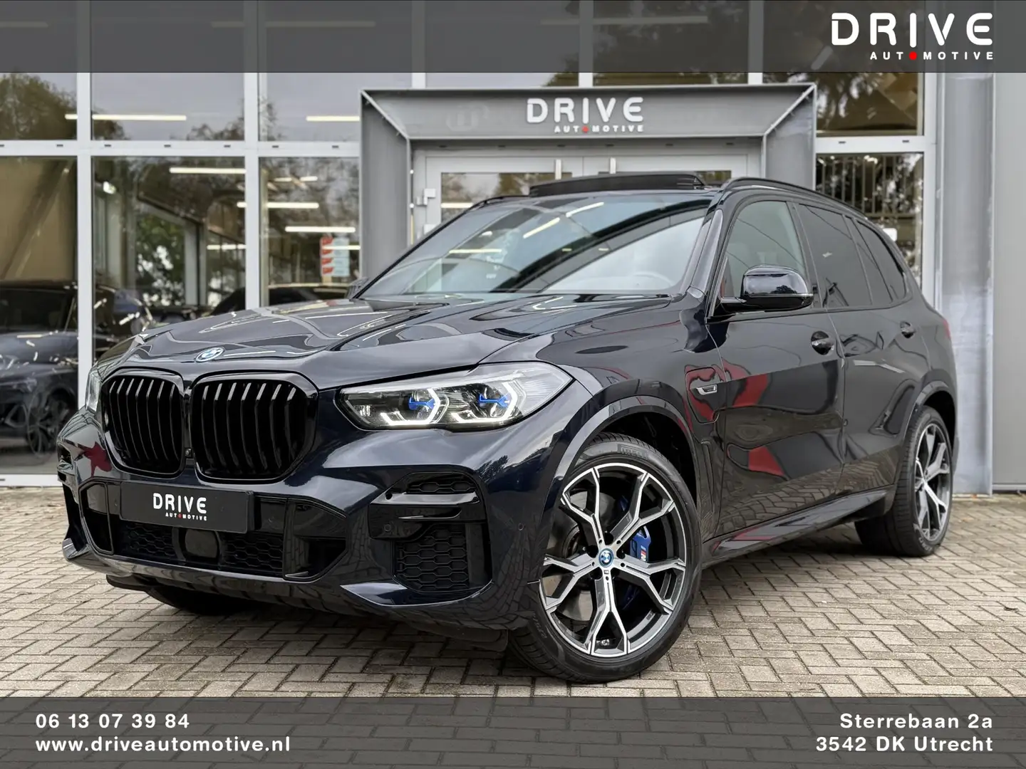 BMW X5 xDrive45e High Ex. M-Sport|SOH96%|Pano|Laser|CoPil Zwart - 1