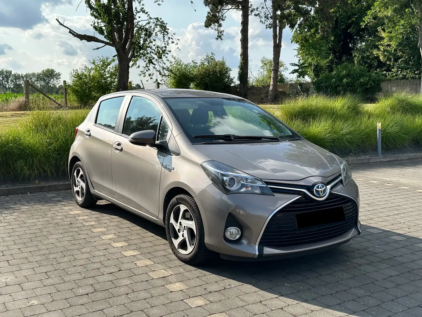 Toyota Yaris Yaris 1.5i VVT-i Hybrid Dynamic E-CVT Бронзовий - 1