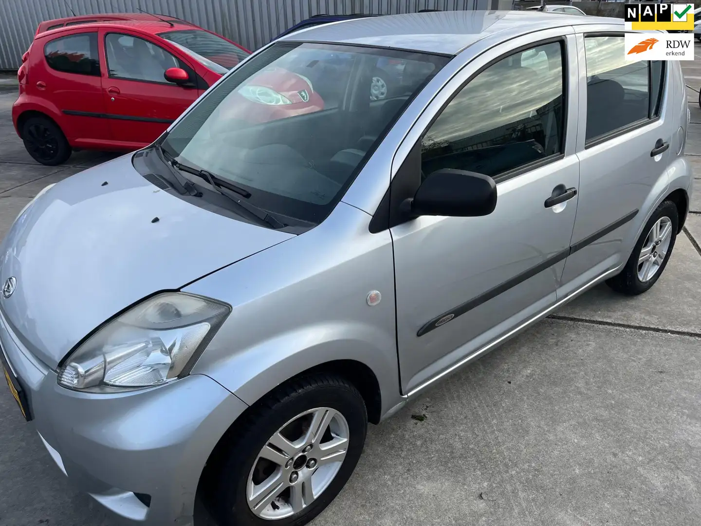 Daihatsu Sirion 2 1.0-12V Premium Gris - 1