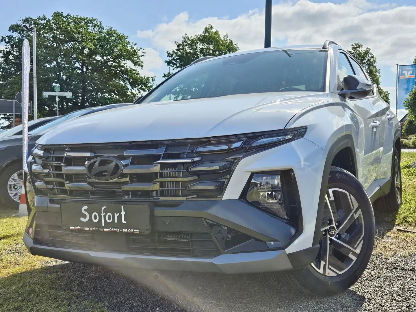 Hyundai TUCSON T-GDI MHEV Climatr. Navi LED Kamera ACC Weiß - 1