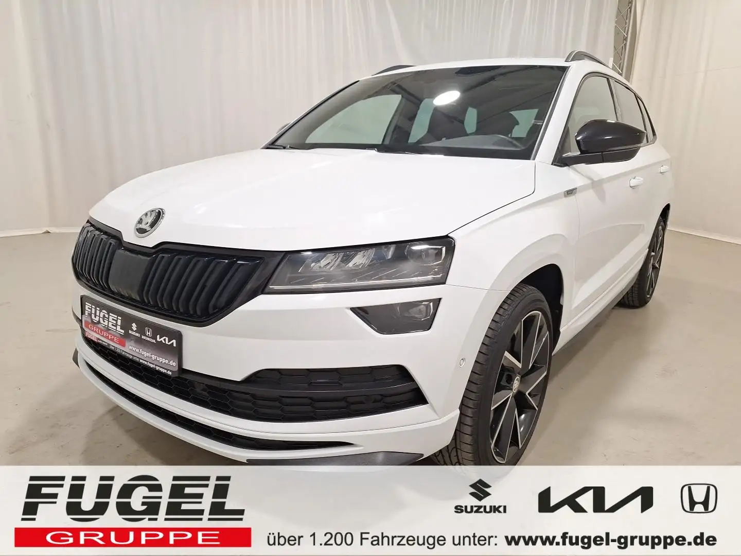 Skoda Karoq 2.0 TSI Sportline 4x4 Pano|virt.Cock.|LED|Navi|SHZ Weiß - 1
