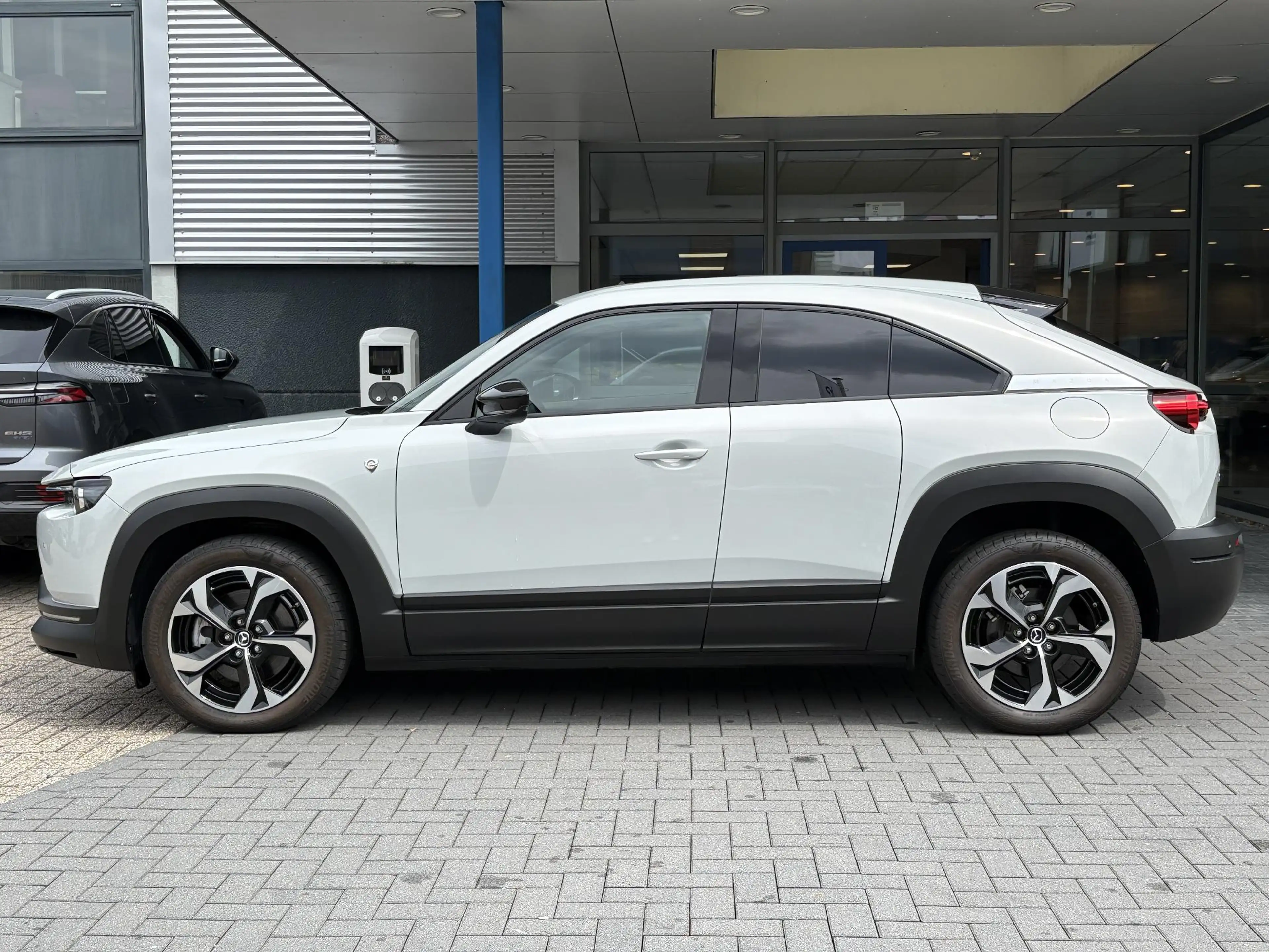 Mazda MX-30 e-SkyActiv R-EV 170 Makoto | Schuifdak | Rondomzic — photo 11
