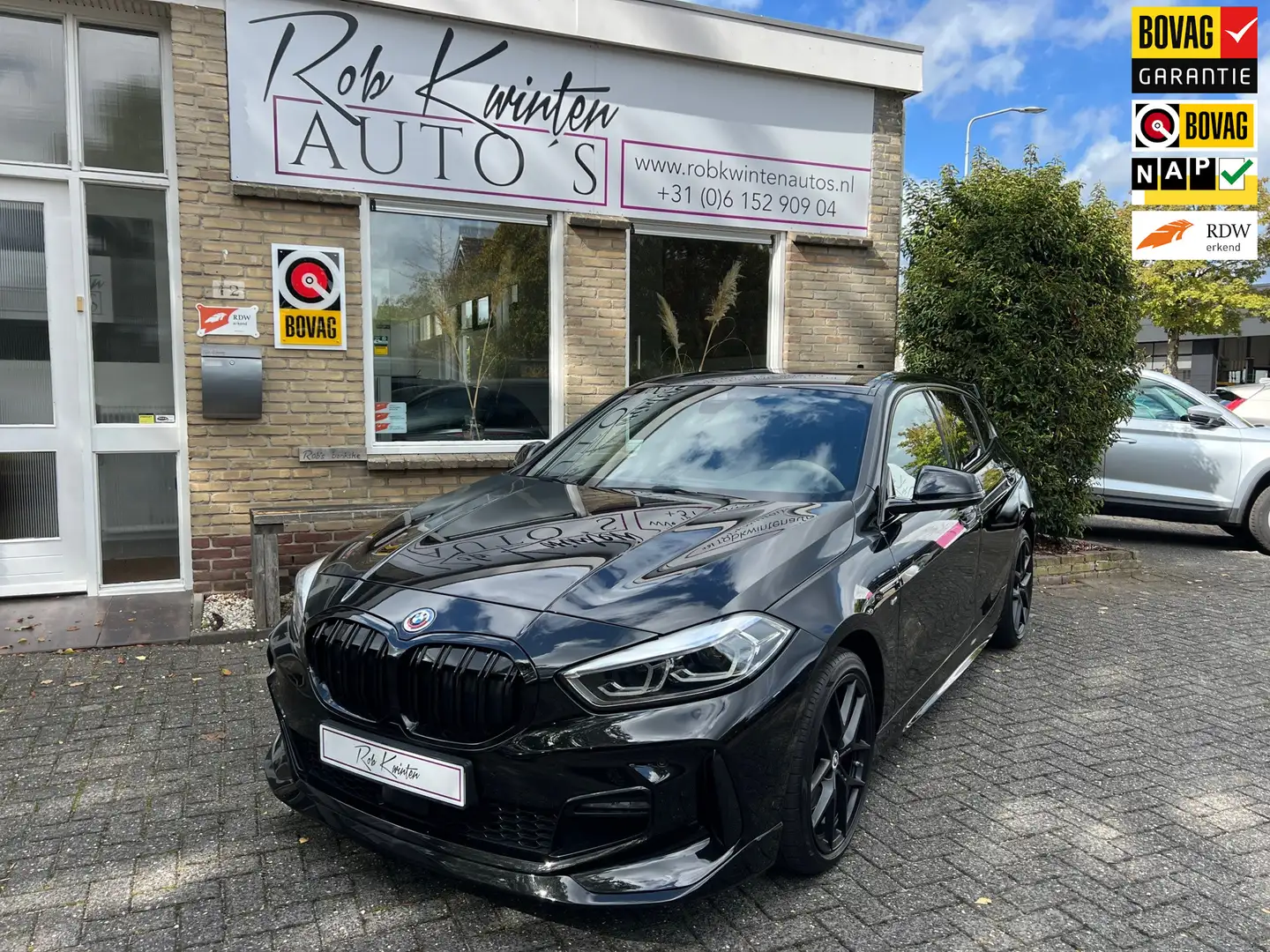 BMW 118 1-serie 118i Executive M-Line Automaat Zwart - 1