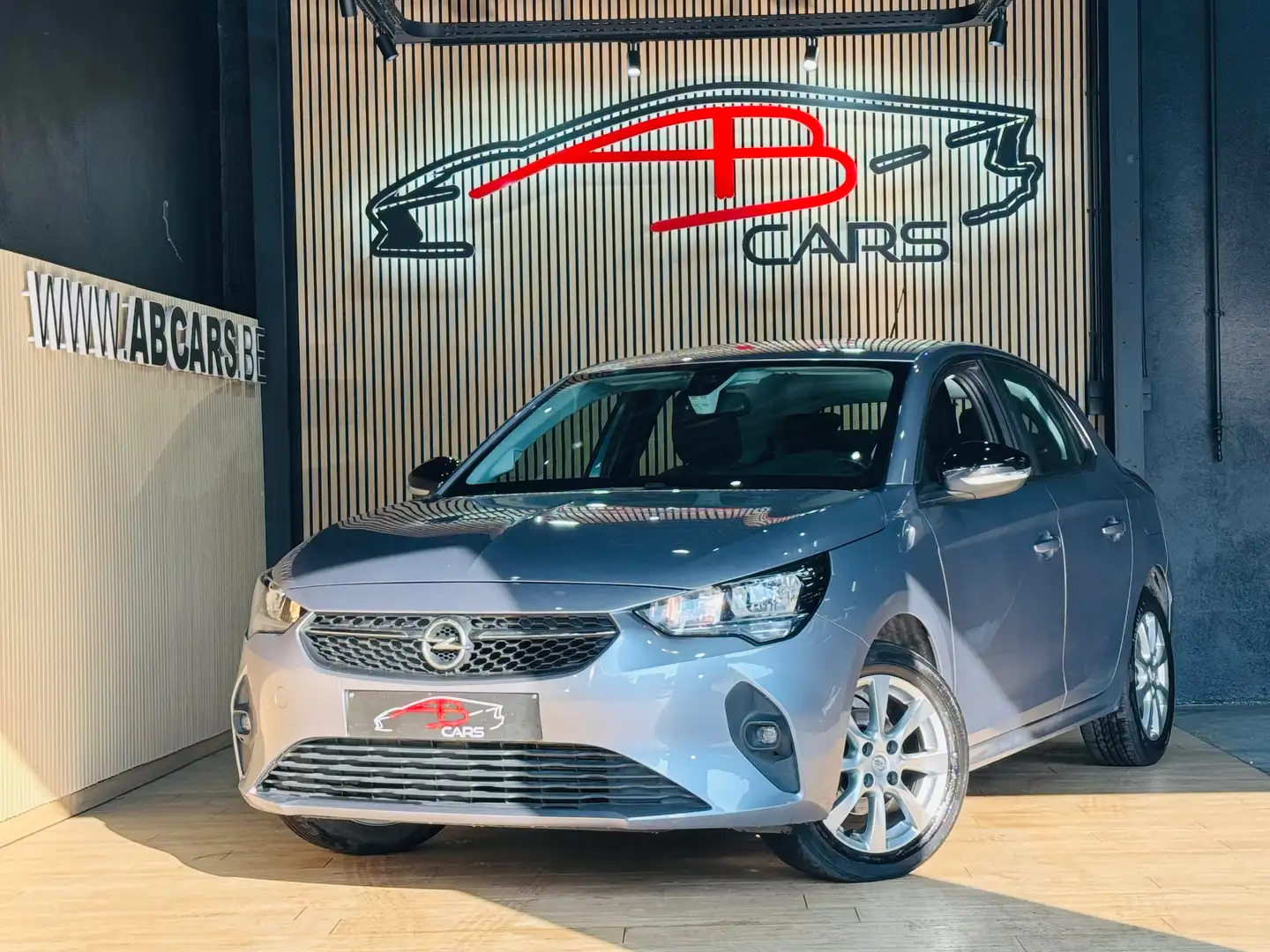 Opel Corsa 1.2i * GARANTIE 12 MOIS * 1ER PROPRIETAIRE * Grijs - 1