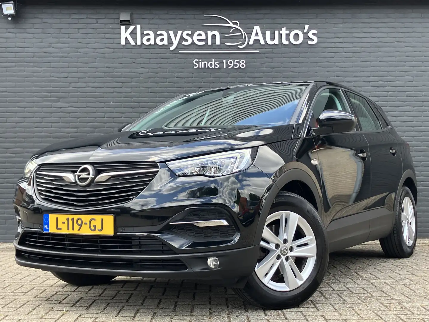 Opel Grandland X 1.2 Turbo Business Edition 130 pk | 1e eigenaar | Zwart - 1