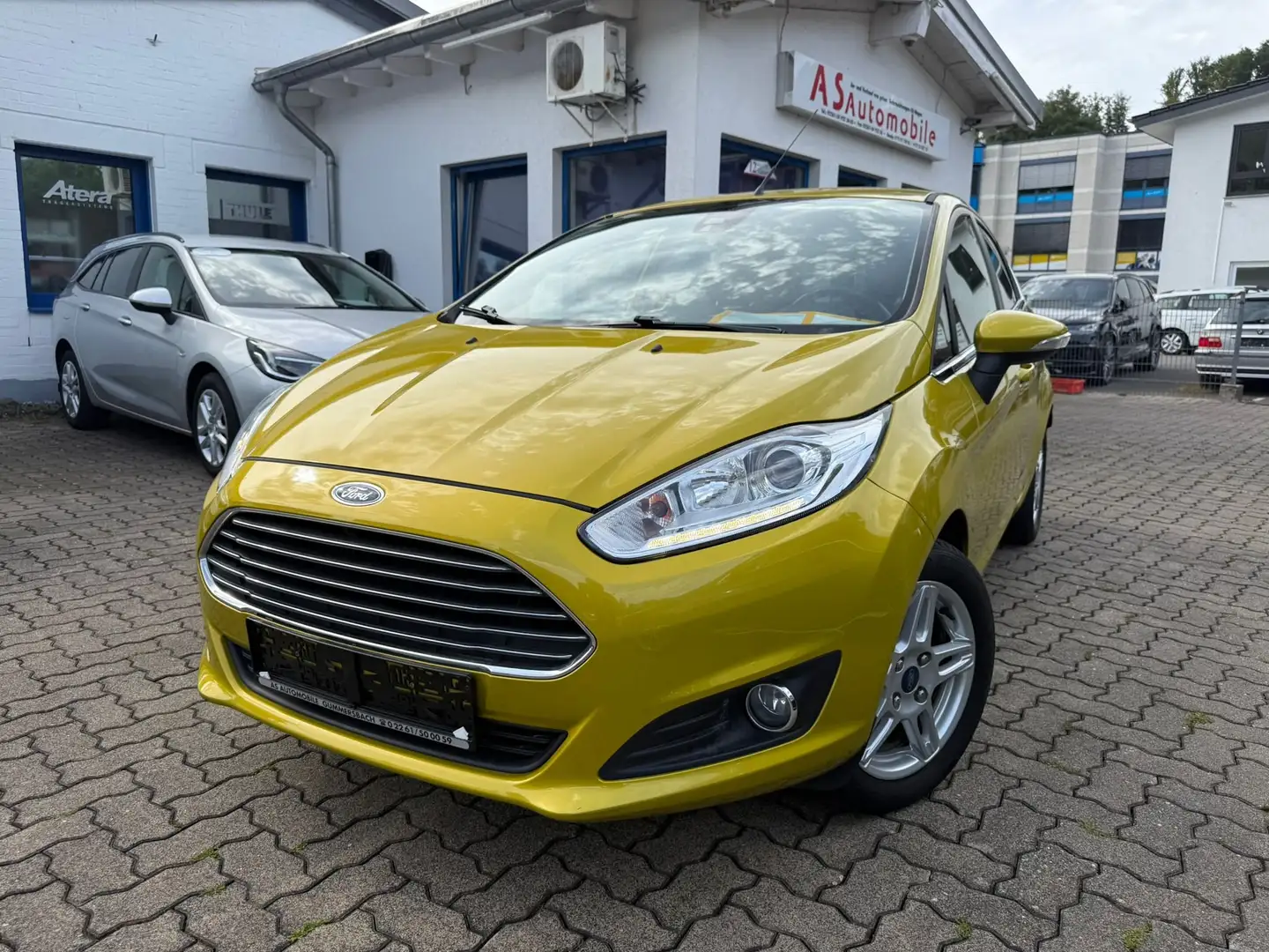 Ford Fiesta 1.0 EcoBoost Titanium+NAVI+KLIMATR+5 TÜR+SHZ Gelb - 1