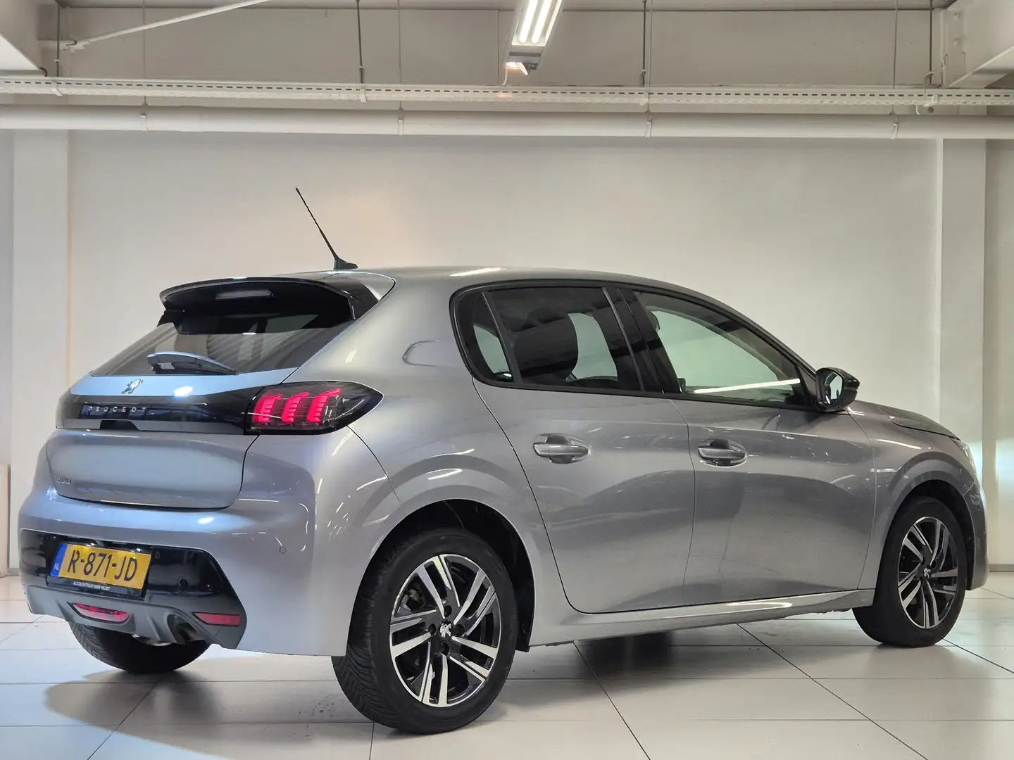 Peugeot 208 1.2 PureTech Allure Pack Navigatie | Achteruitrijc Gris - 2