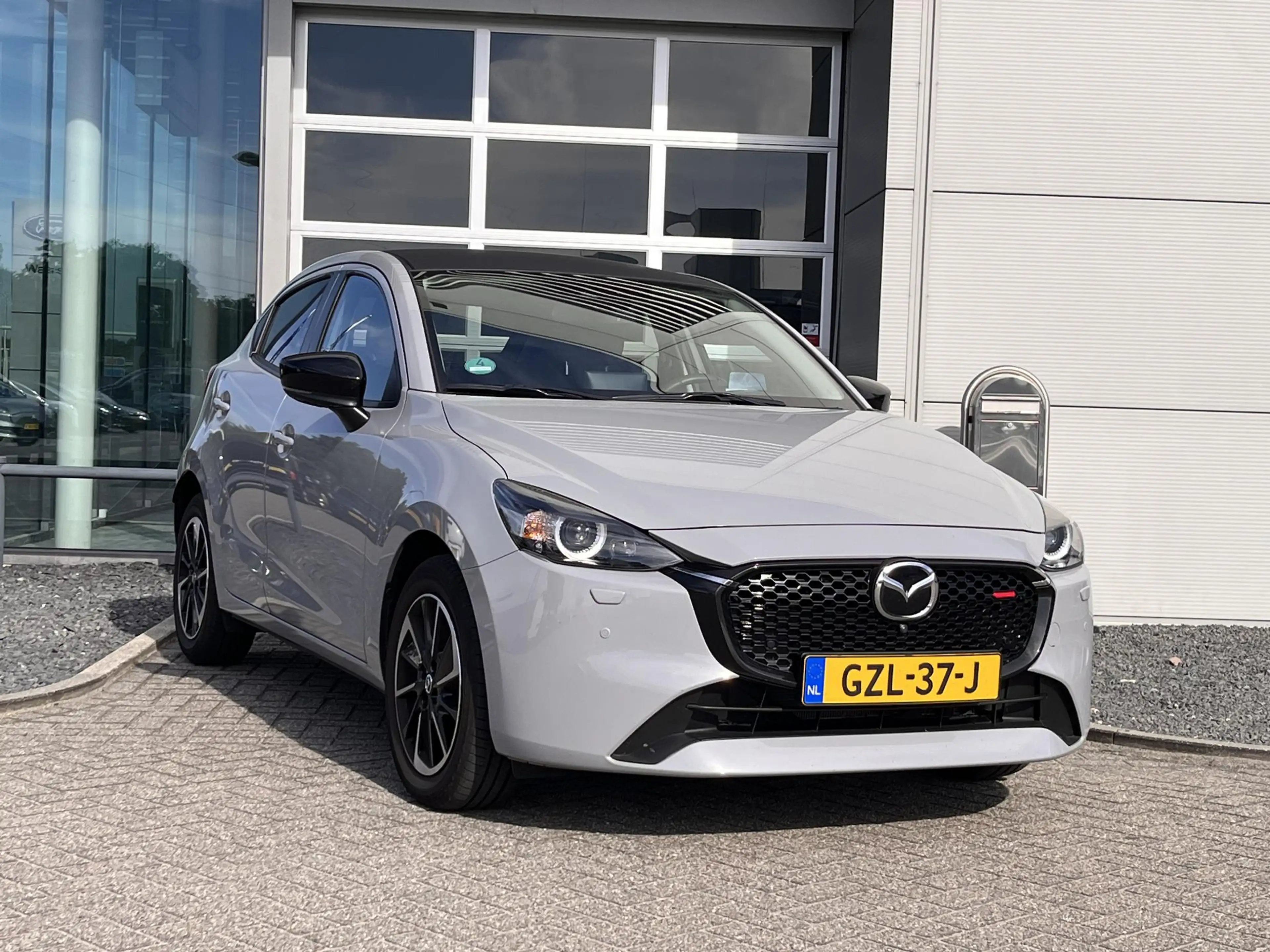 Mazda 2 1.5 e-SkyActiv-G 90 Homura Aka Navigatie | 360 cam — photo 3