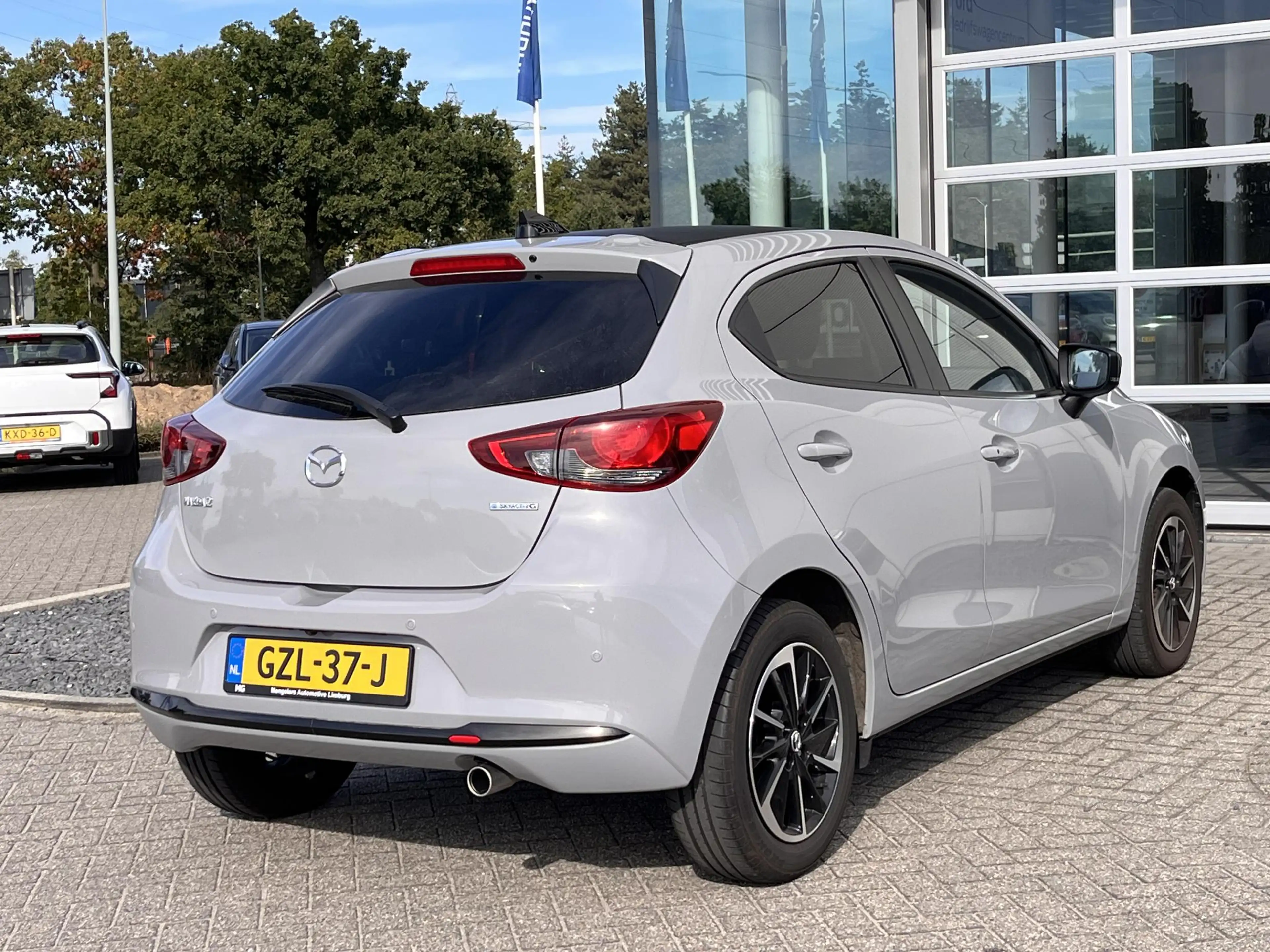 Mazda 2 1.5 e-SkyActiv-G 90 Homura Aka Navigatie | 360 cam — photo 6