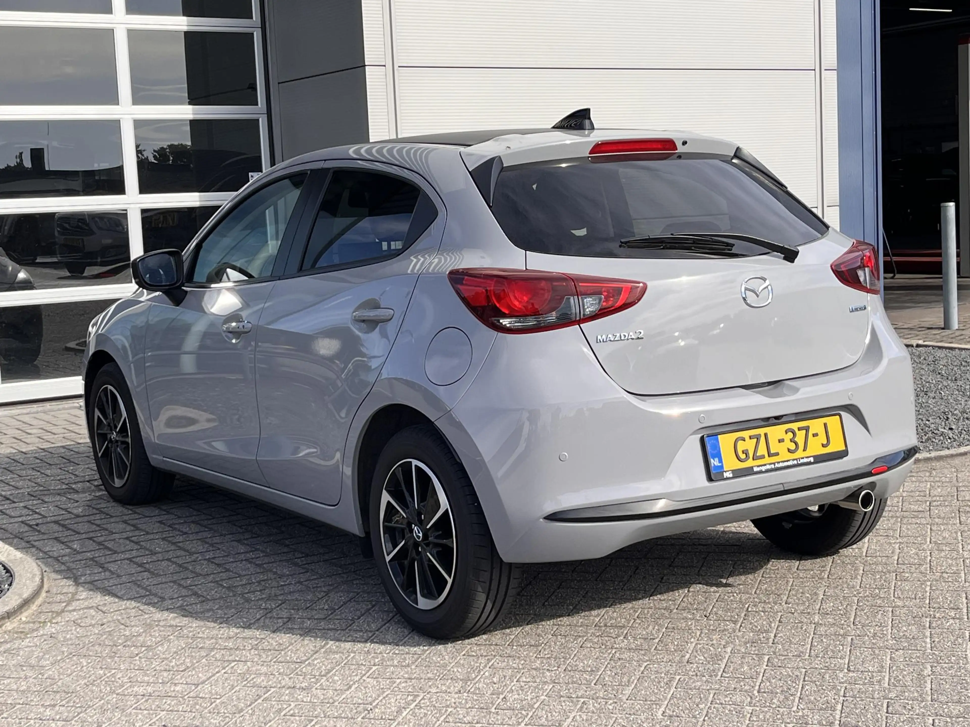 Mazda 2 1.5 e-SkyActiv-G 90 Homura Aka Navigatie | 360 cam — photo 8
