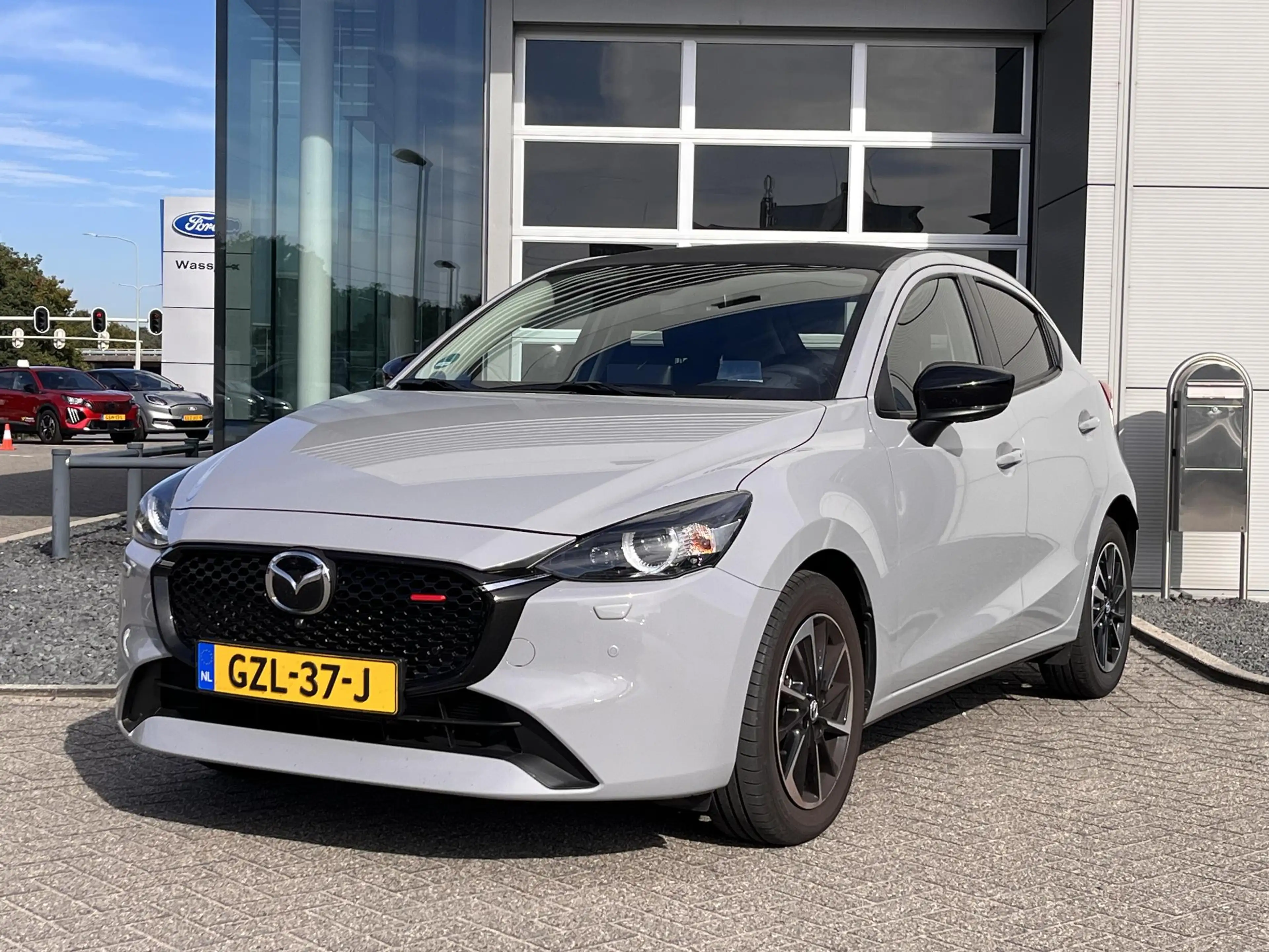 Mazda 2 1.5 e-SkyActiv-G 90 Homura Aka Navigatie | 360 cam — photo 2