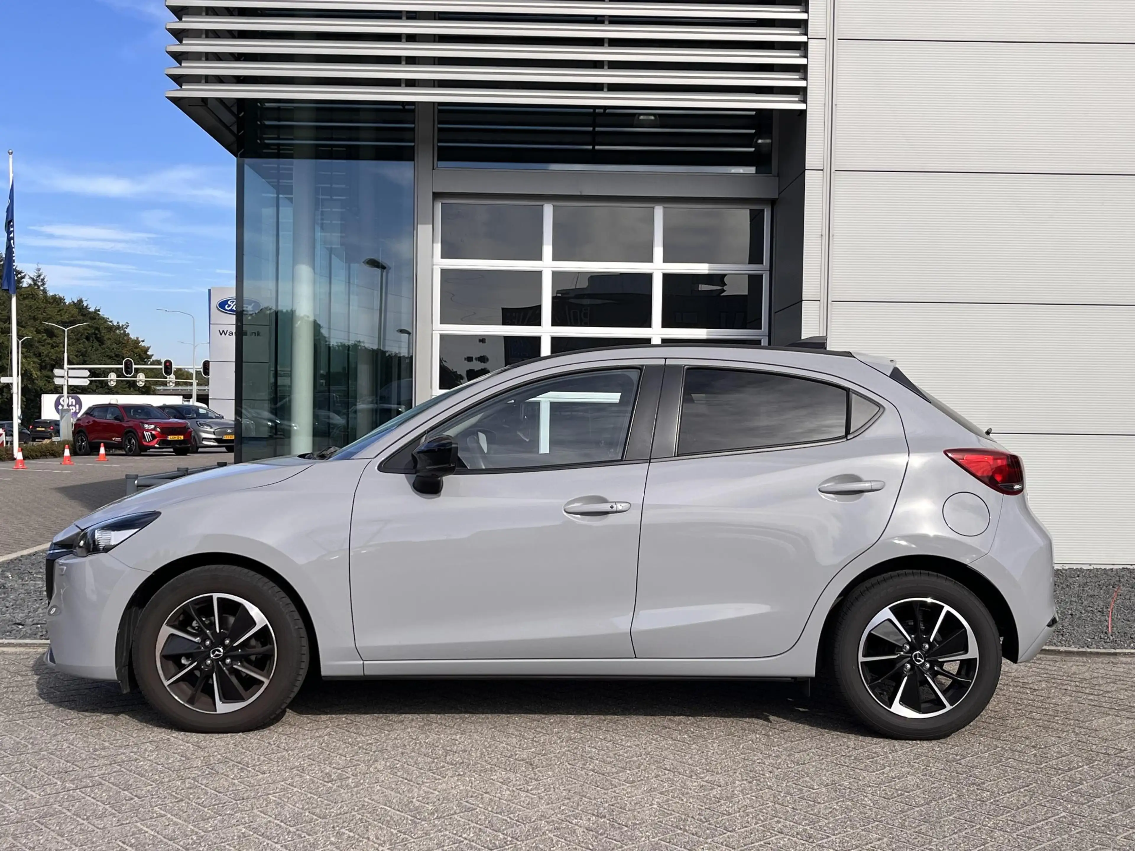 Mazda 2 1.5 e-SkyActiv-G 90 Homura Aka Navigatie | 360 cam — photo 7