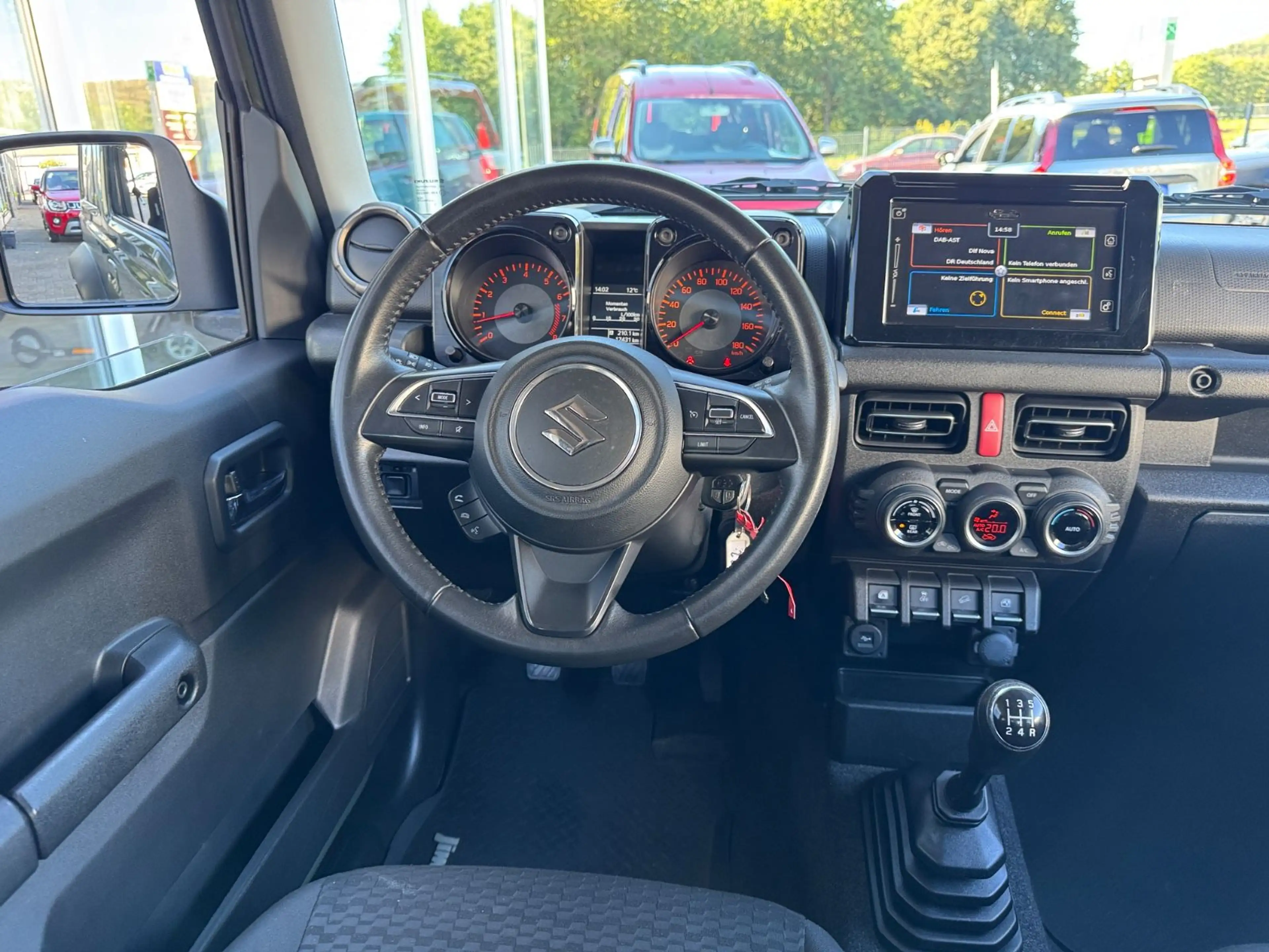 Suzuki Jimny Comfort+ AllGrip 4-SITZER 1.HAND NAVI AHK — photo 11