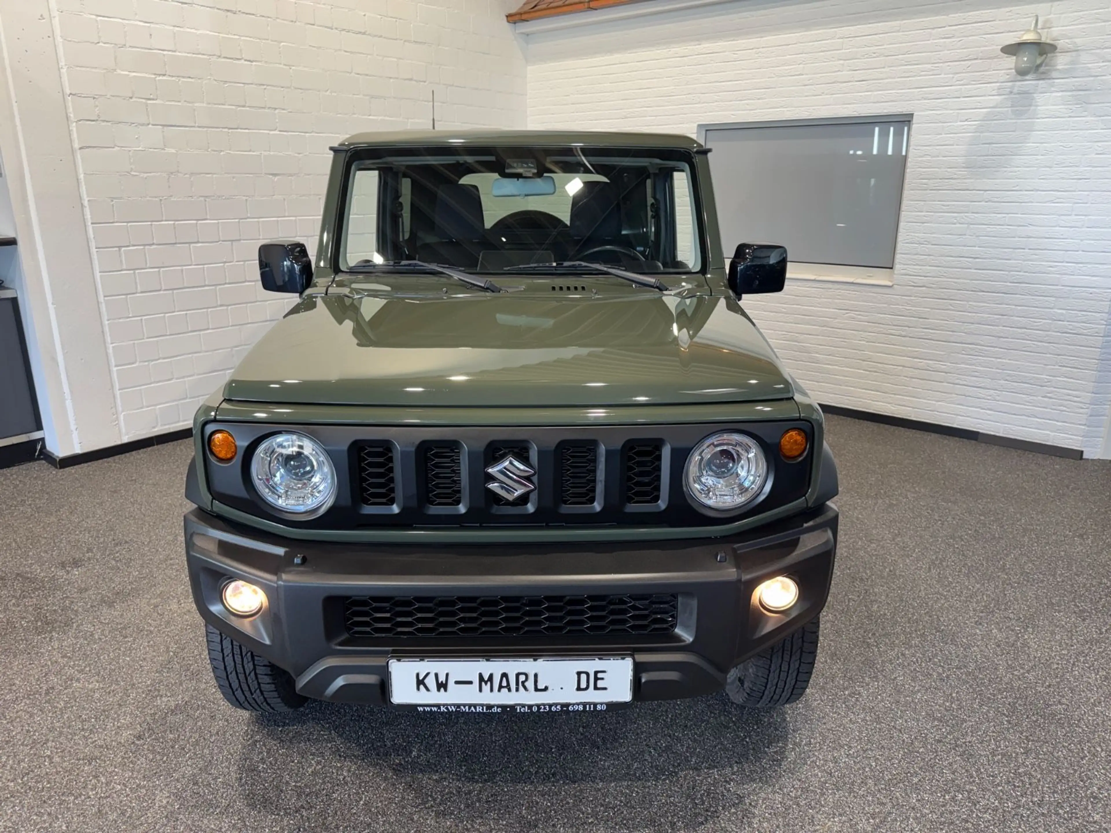 Suzuki Jimny Comfort+ AllGrip 4-SITZER 1.HAND NAVI AHK — photo 2