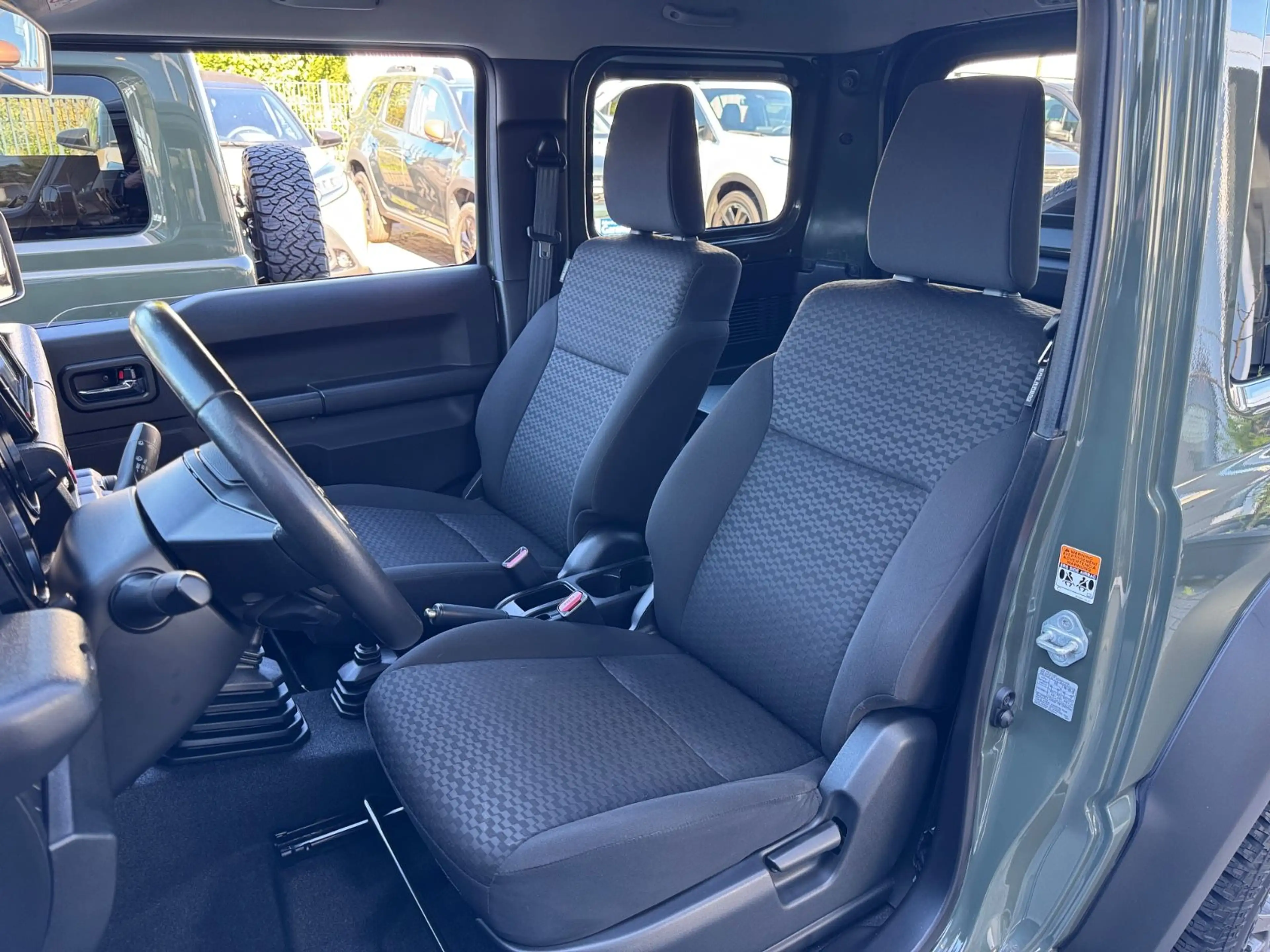 Suzuki Jimny Comfort+ AllGrip 4-SITZER 1.HAND NAVI AHK — photo 14