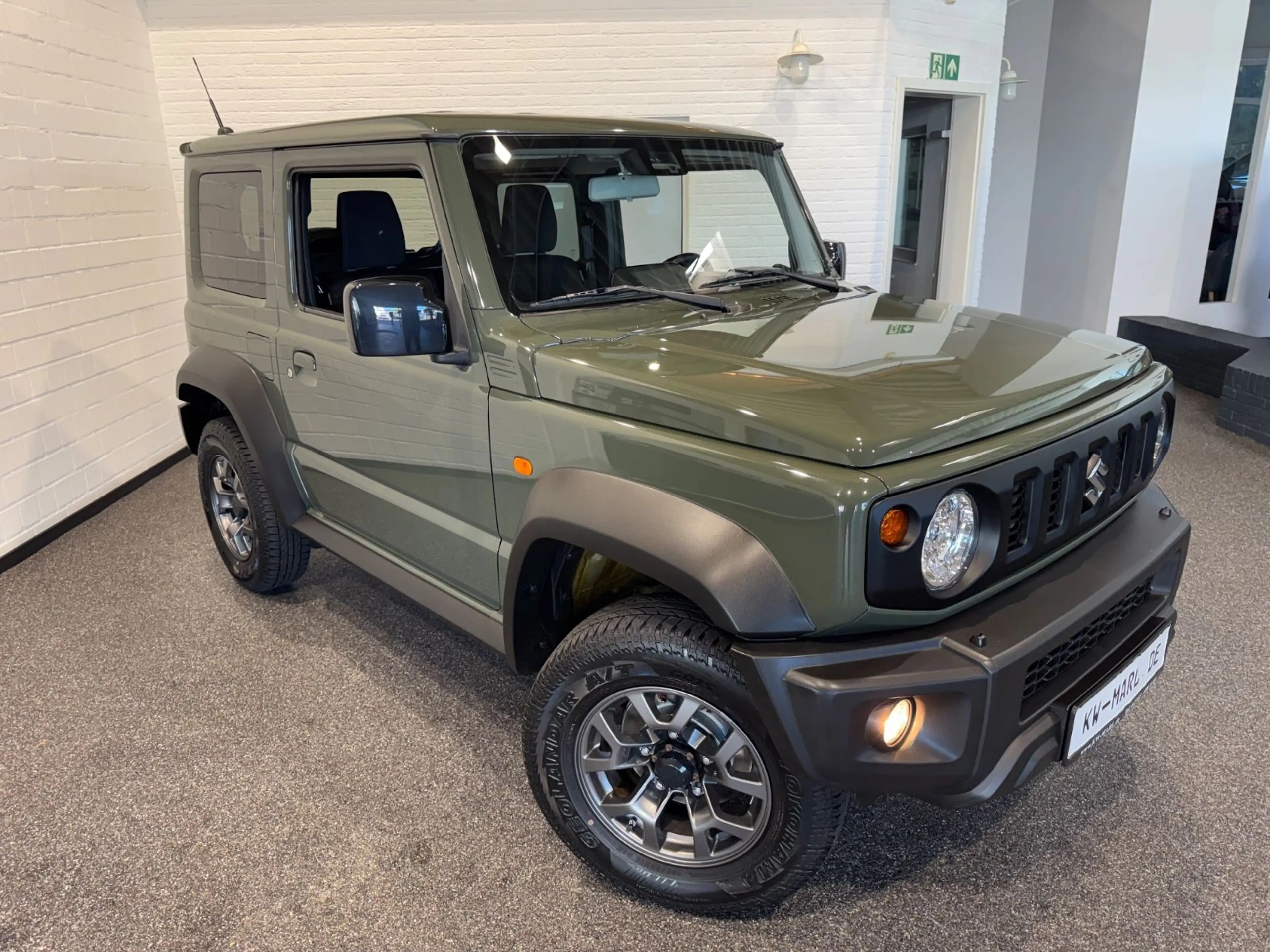 Suzuki Jimny Comfort+ AllGrip 4-SITZER 1.HAND NAVI AHK — photo 3