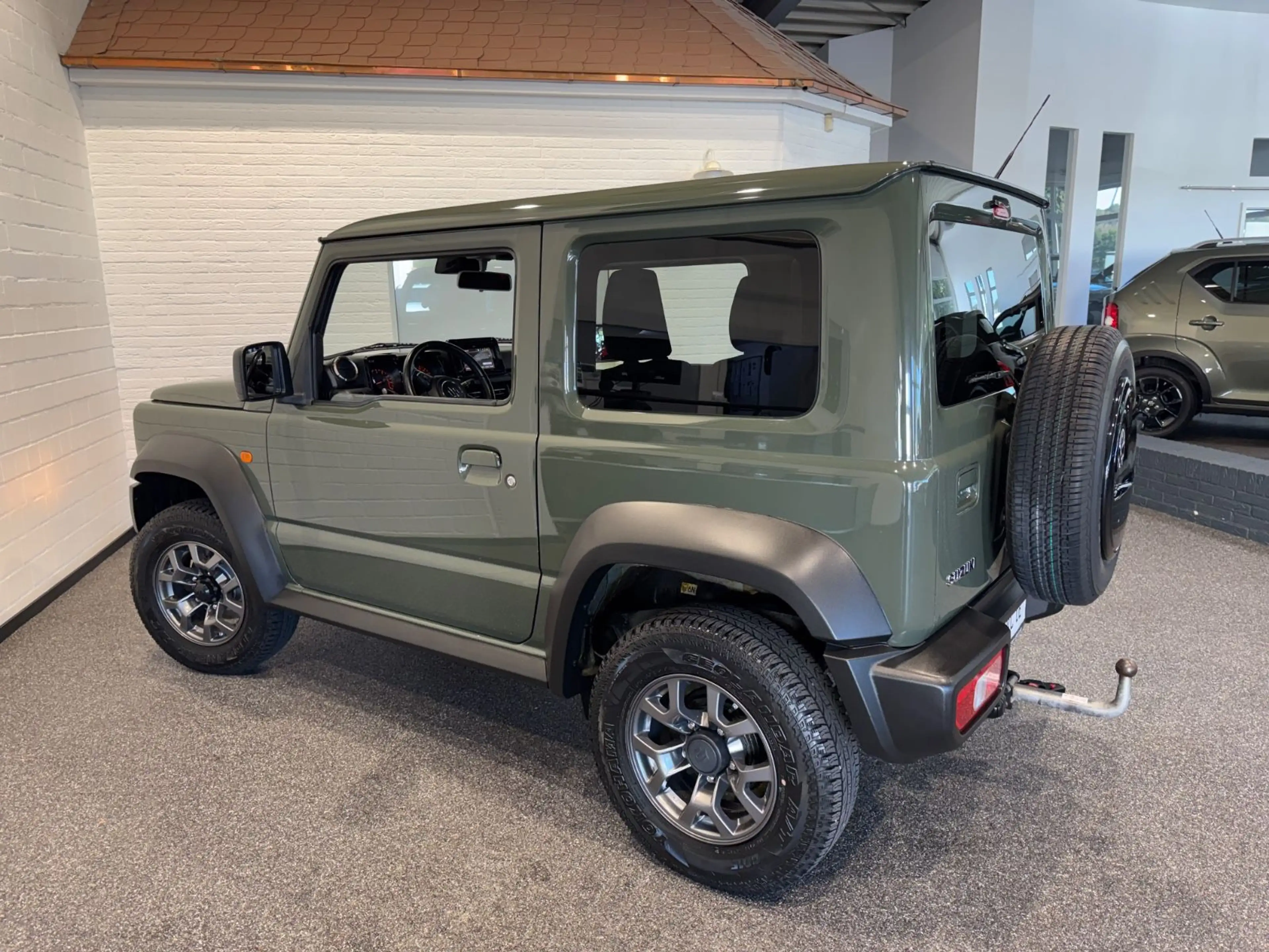 Suzuki Jimny Comfort+ AllGrip 4-SITZER 1.HAND NAVI AHK — photo 7