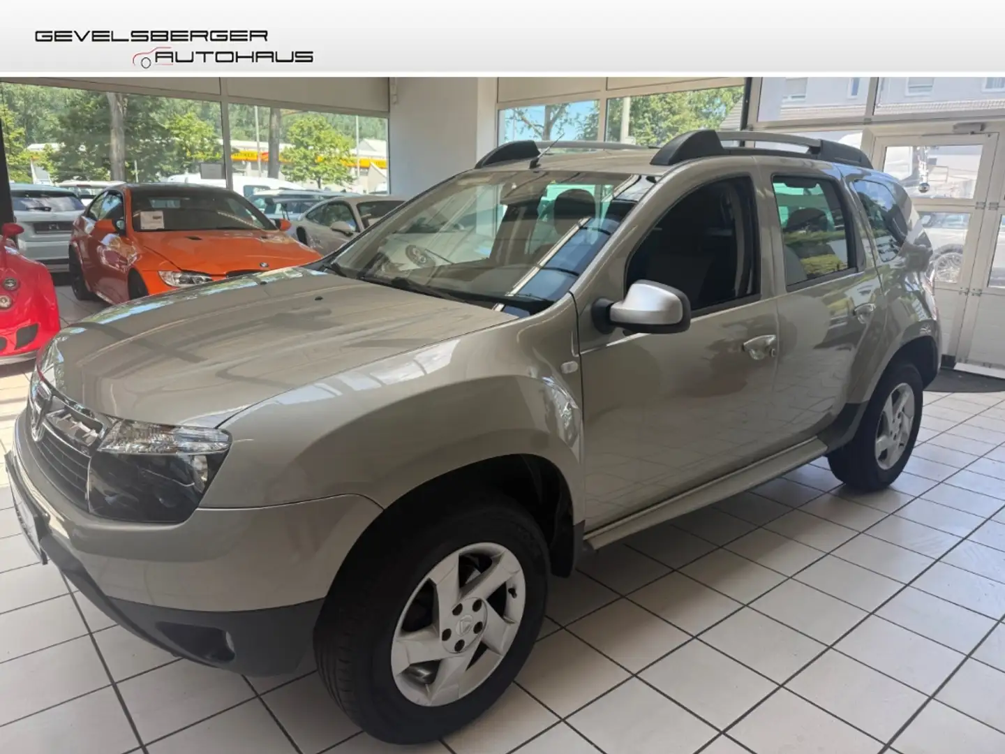 Dacia Duster I Laureate 4x4 1.6 16V 105 aus 1.Hand scheckheft Bronze - 1