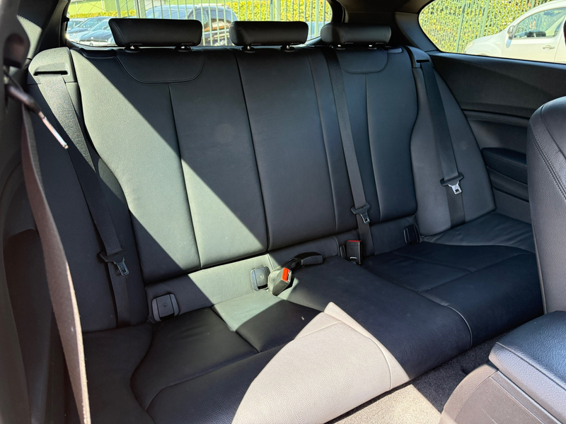 BMW 114 1-serie 114i Business+ Clima | Leer | Navi | LM | — photo 9
