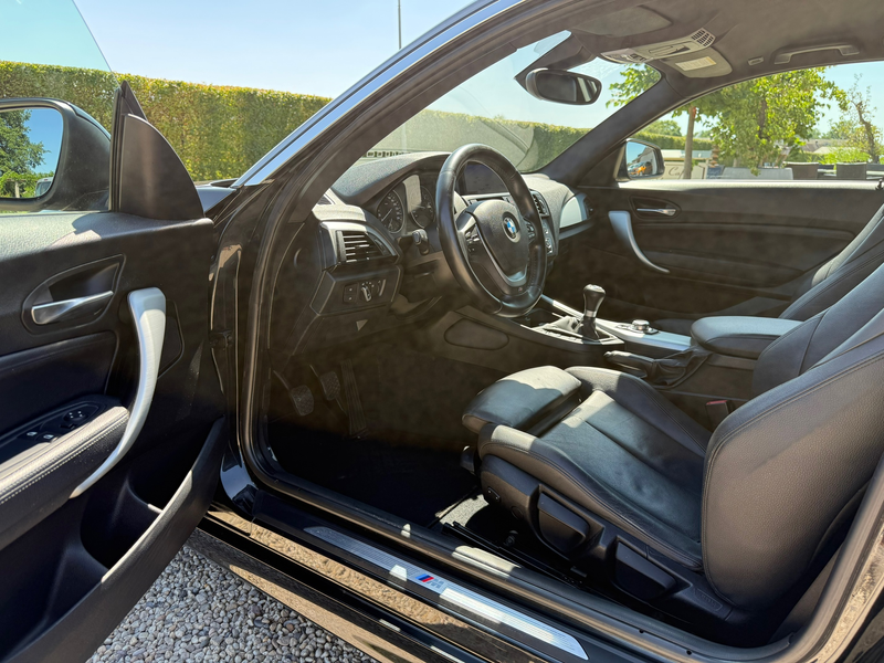 BMW 114 1-serie 114i Business+ Clima | Leer | Navi | LM | — photo 12