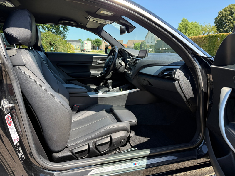 BMW 114 1-serie 114i Business+ Clima | Leer | Navi | LM | — photo 6