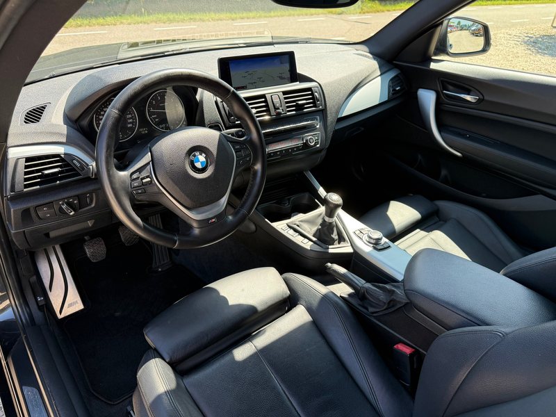BMW 114 1-serie 114i Business+ Clima | Leer | Navi | LM | — photo 13