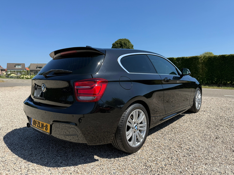 BMW 114 1-serie 114i Business+ Clima | Leer | Navi | LM | — photo 3