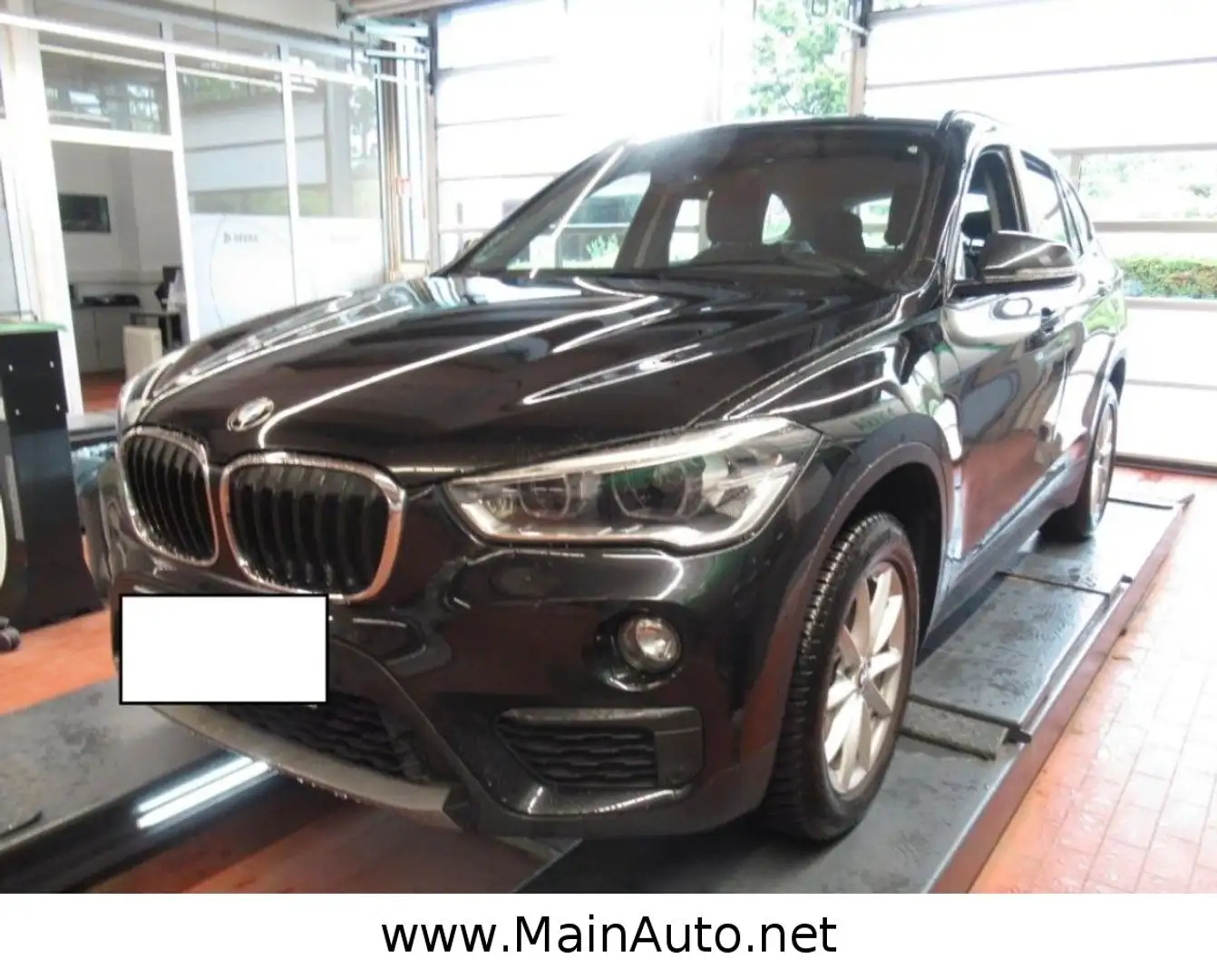 BMW X1 sDrive 18d 1.Hand/Aut/SportSitze/CAM/HiFi/LED Schwarz - 1