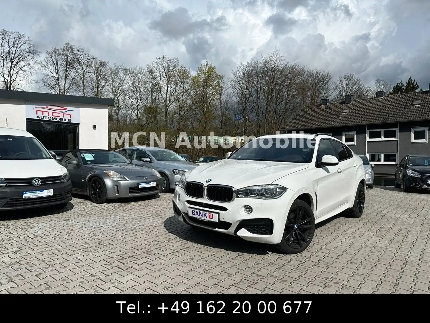 BMW X6 xDrive40d M-Paket SHZ*STAND HZ*SOFTCLOSE*360 Wit - 1