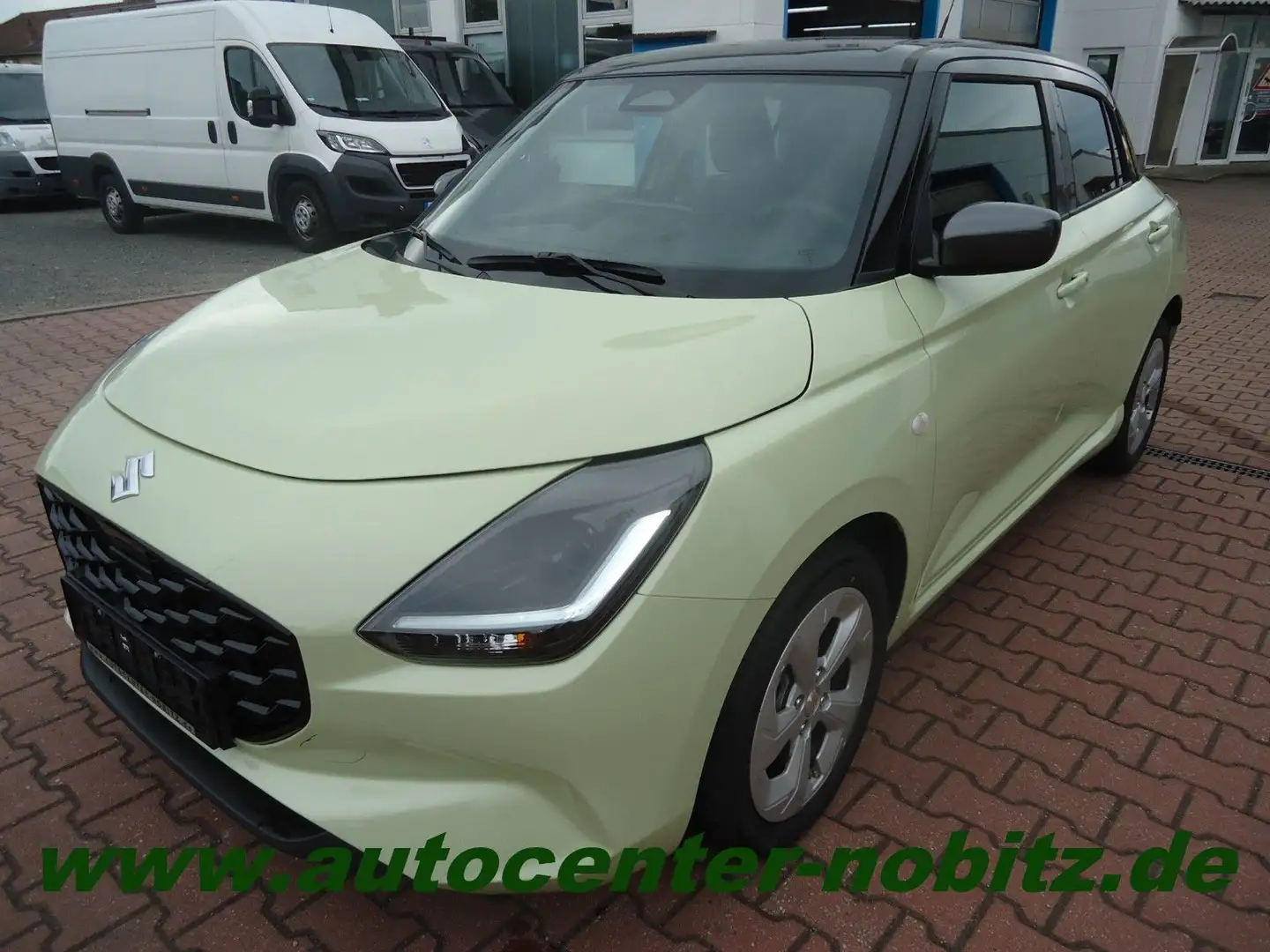 Suzuki Swift 1.2 Dualjet Hybrid 61 kW Comfort *Navi-LED Gelb - 1