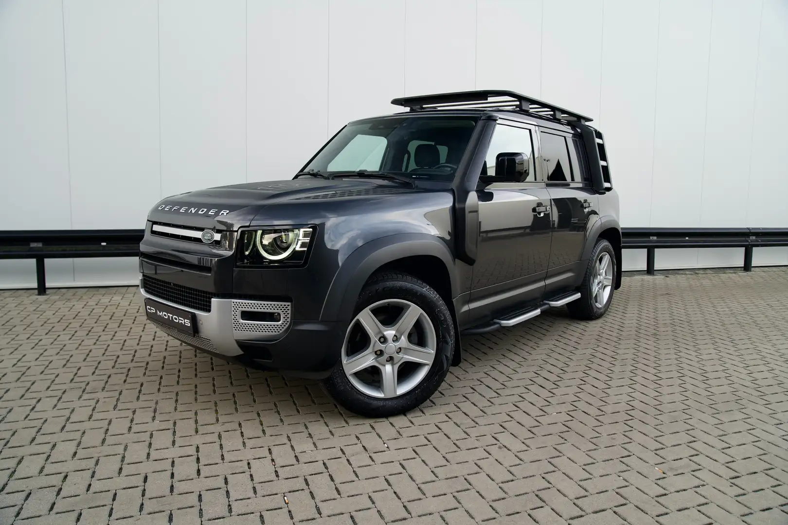 Land Rover Defender 110 D200 SE | PANO | EXPLORER | LUCHTVERING | BTW Grau - 1