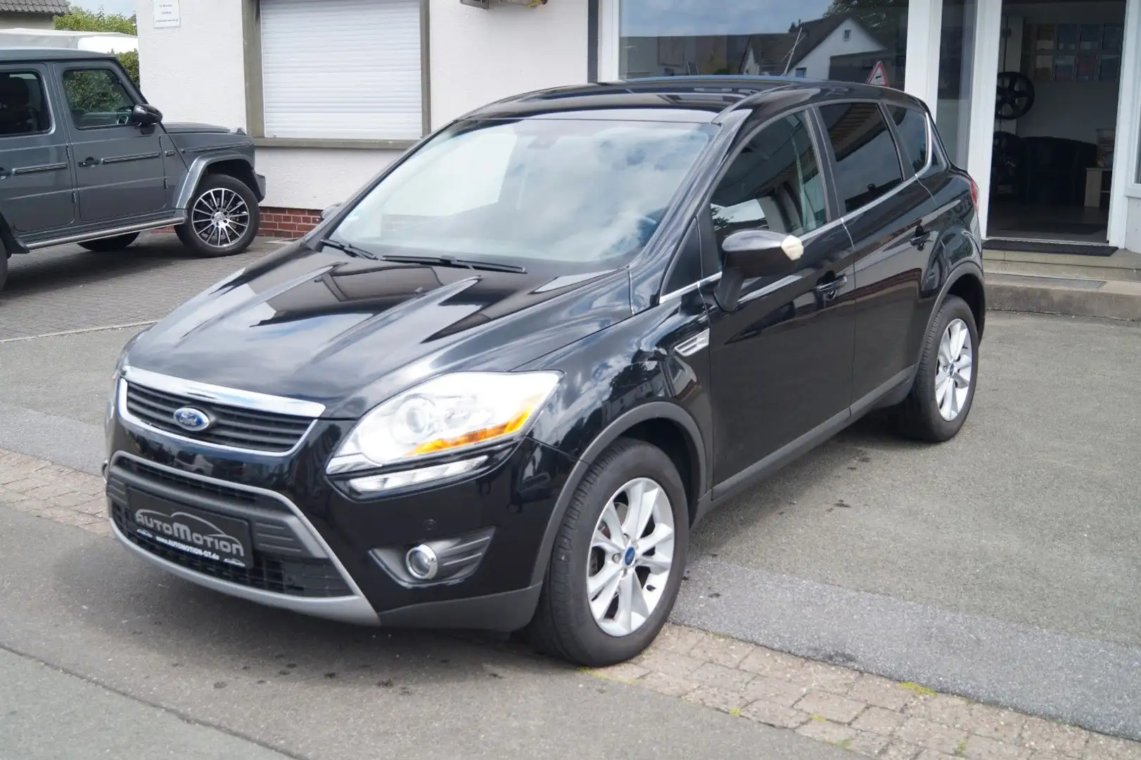 Ford Kuga Titanium*Navi*T.-Leder*Bi-Xenon*RFK*SHZ*MFL Schwarz - 1