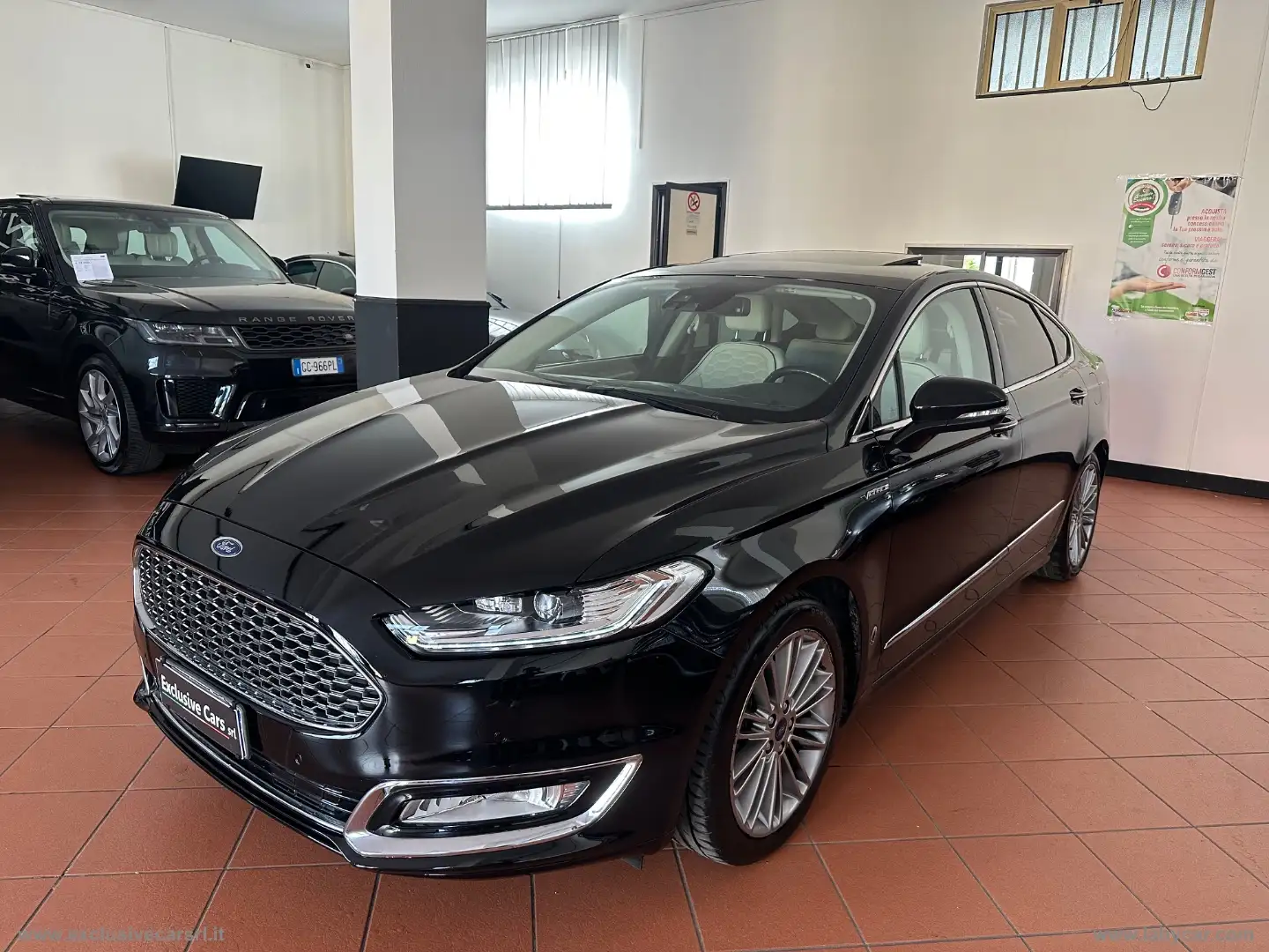 Ford Mondeo F.Hybrid 2.0 187CV eCVT 4p. Vign. FULL OPTIONAL Zwart - 1