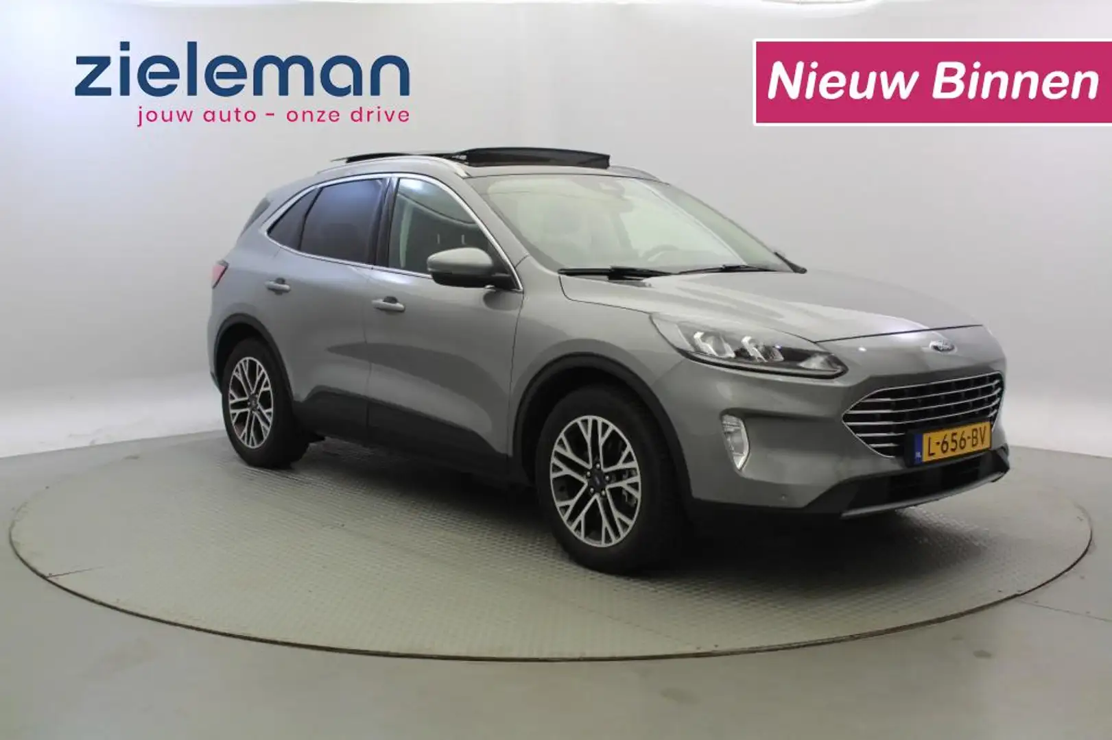 Ford Kuga 2.5 PHEV Titanium - Panorama, Carplay, Clima Grijs - 1
